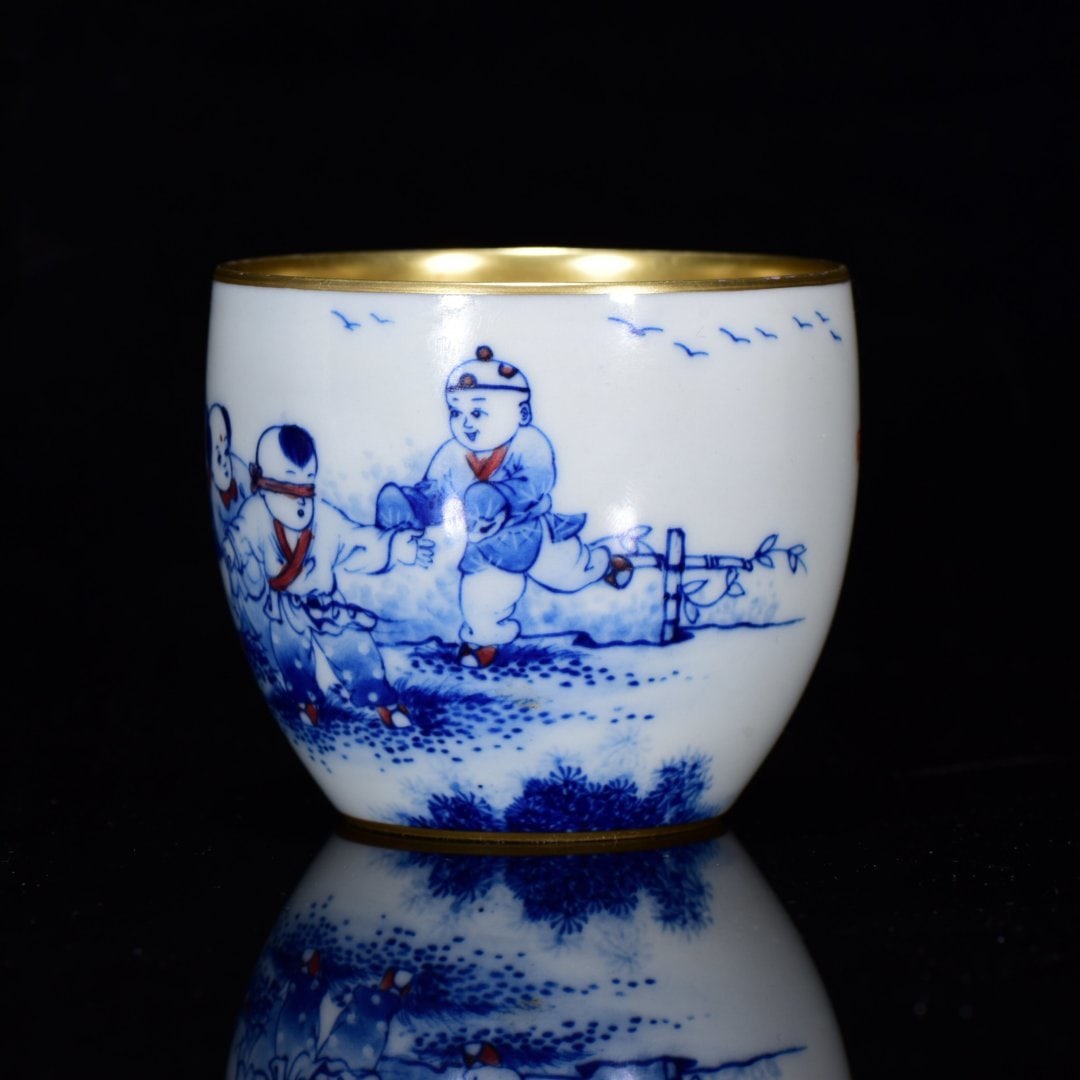 An Exquisite Blue and White Underglaze-Red Painted Gold Character and Story Pattern Cup: An Exquisite Blue and White Underglaze-Red Painted Gold Character and Story Pattern Cup,Qing Dynasty,China,With Mark,Size:2.4inx2.8in 