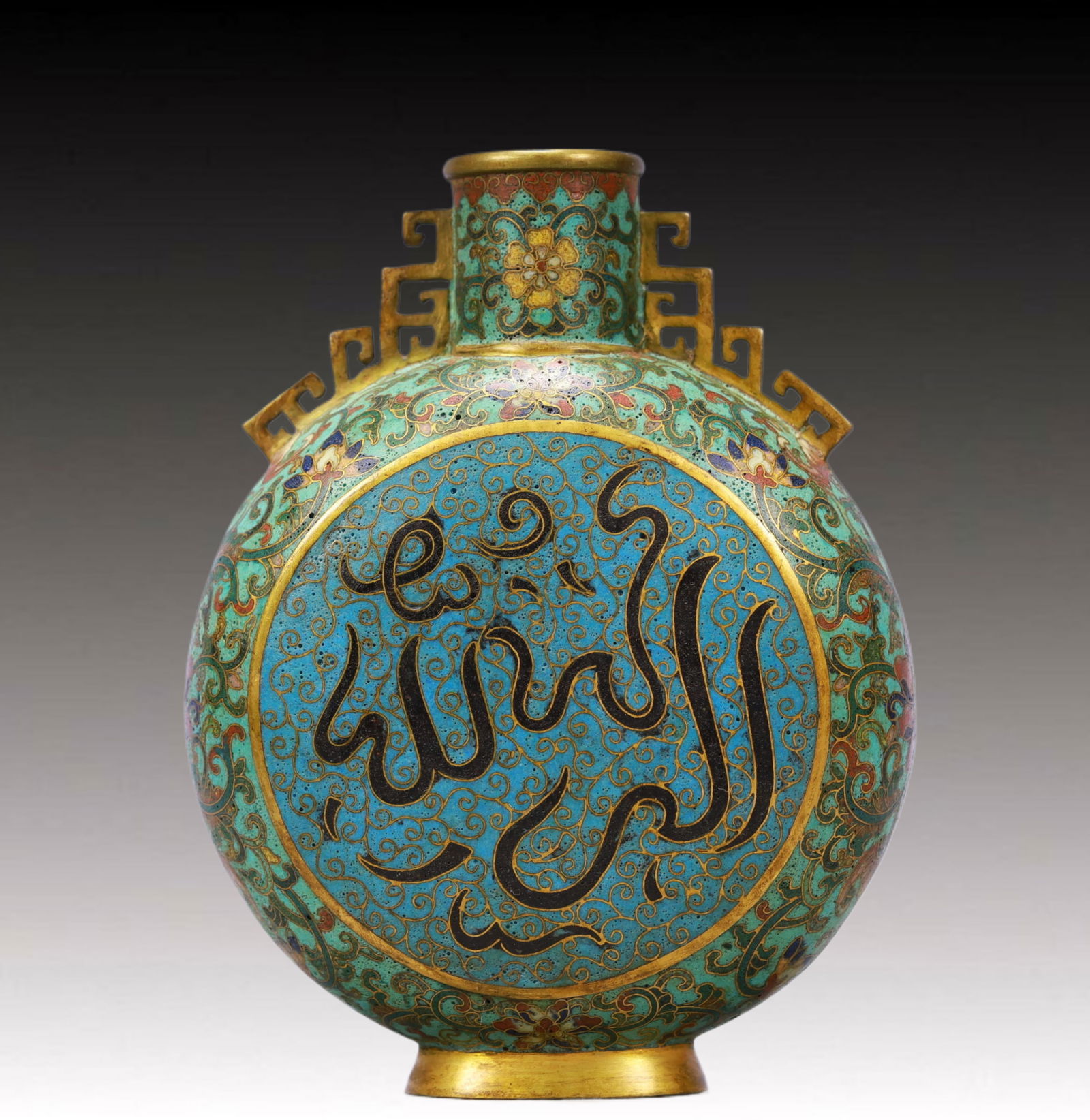 An Exquisite Cloisonne Lotus Pattern Double-Ears Vase,With Sanskrit: An Exquisite Cloisonne Lotus Pattern Double-Ears Vase,With Sanskrit,Qing Dynasty,China,Size:4.7inx2inx5.9in,Weight:600g 景泰蓝缠枝莲纹双耳瓶