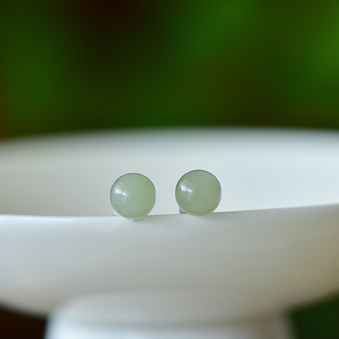 A Pair of Exquisite Sterling Silver Inlaid Greenish Jade Earrings: A Pair of Exquisite Sterling Silver Inlaid Greenish Jade Earrings,Size:0.3inx0.3in 一对纯银镶青玉耳环