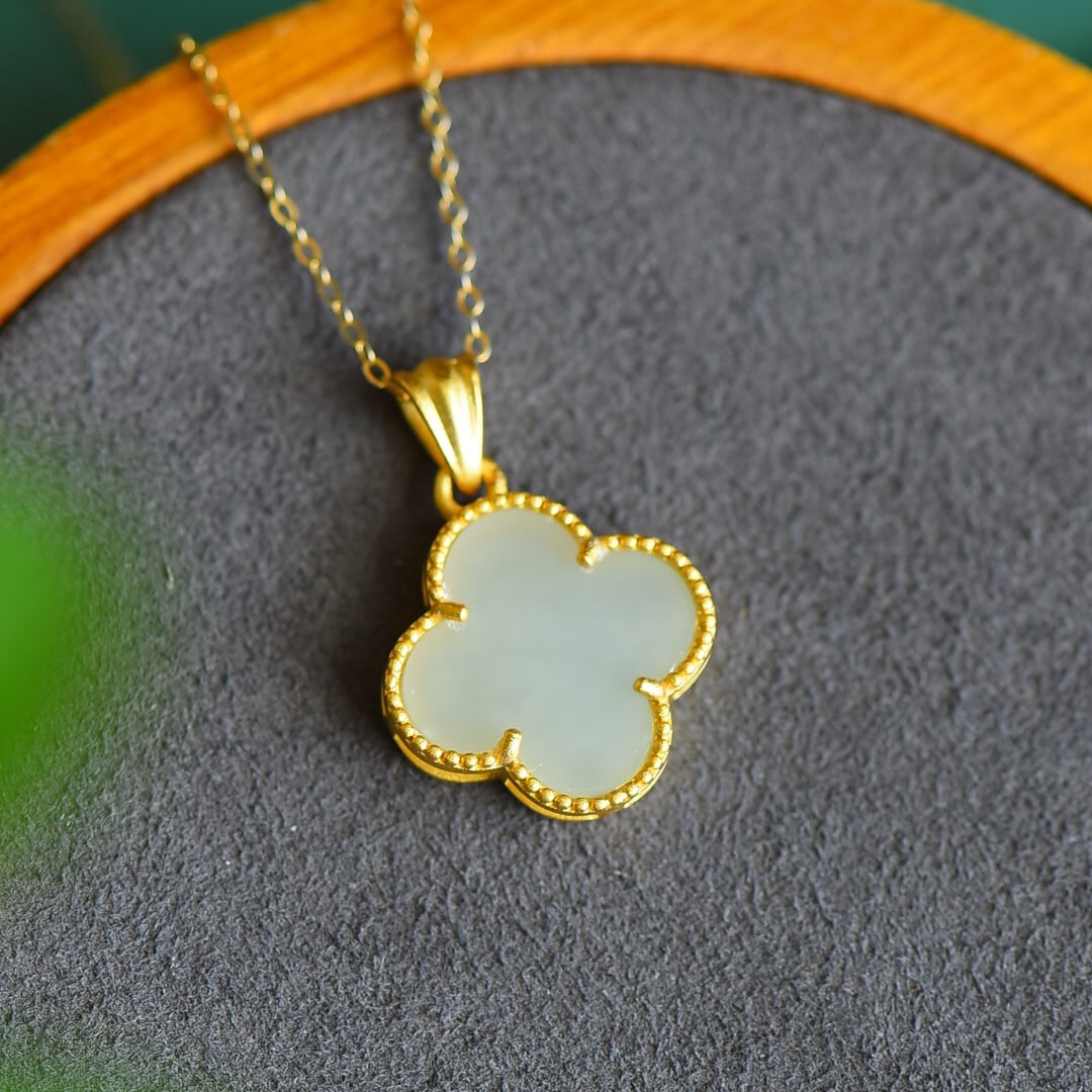 An Exquisite Sterling Silver-Gold Plated Inlaid White Jade Pendant: An Exquisite Sterling Silver-Gold Plated Inlaid White Jade Pendant 纯银镀金镶白玉吊坠