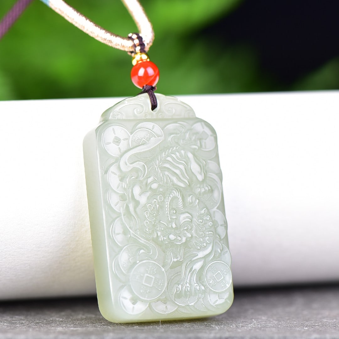 An Exquisite White Jade Wealth-Attracting Creature Pendant: An Exquisite White Jade Wealth-Attracting Creature Pendant,Size:1.2inx2in 白玉貔貅挂件