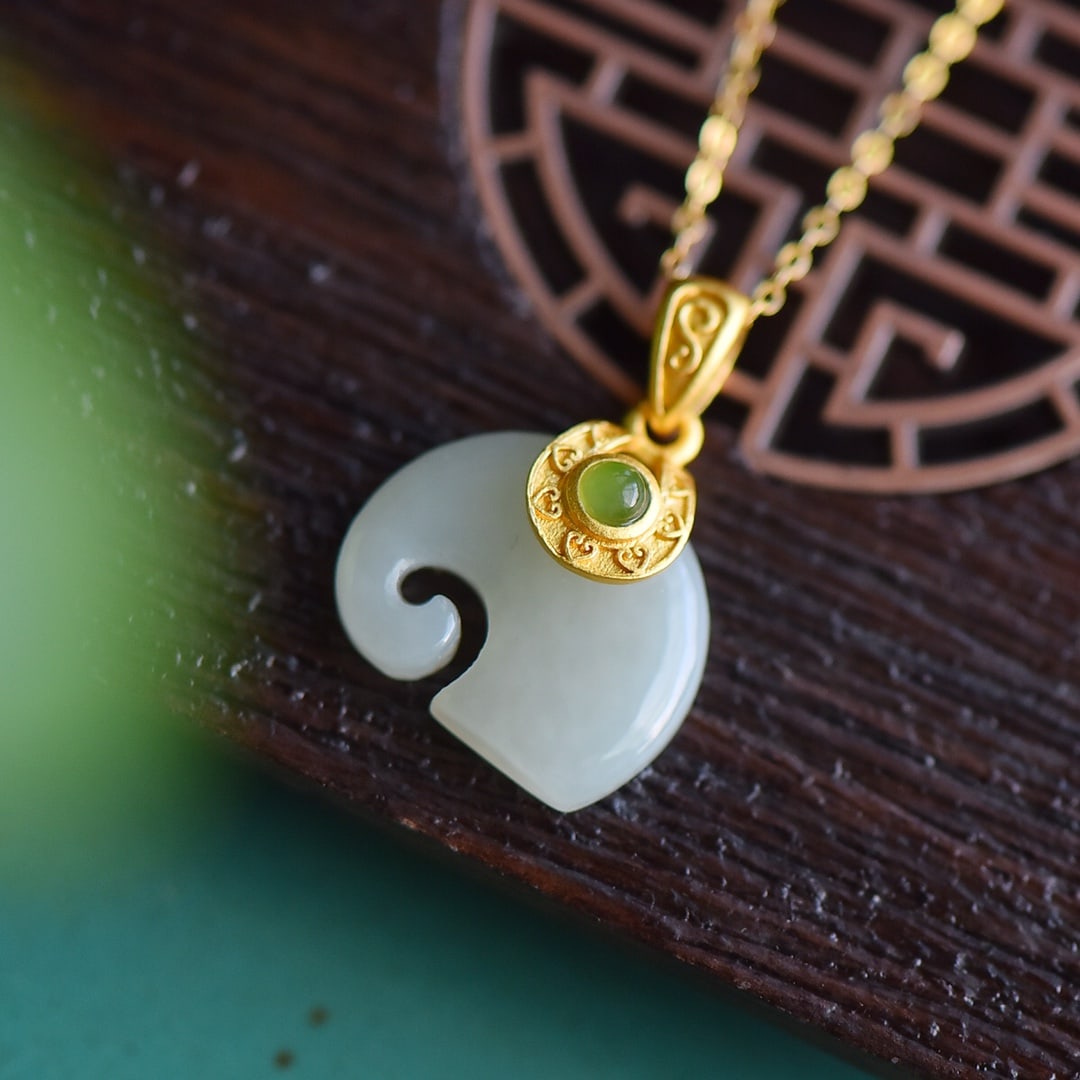 An Exquisite Sterling Silver-Gold Plated Inlaid White Jade Pendant: An Exquisite Sterling Silver-Gold Plated Inlaid White Jade Pendant 纯银镀金镶白玉吊坠