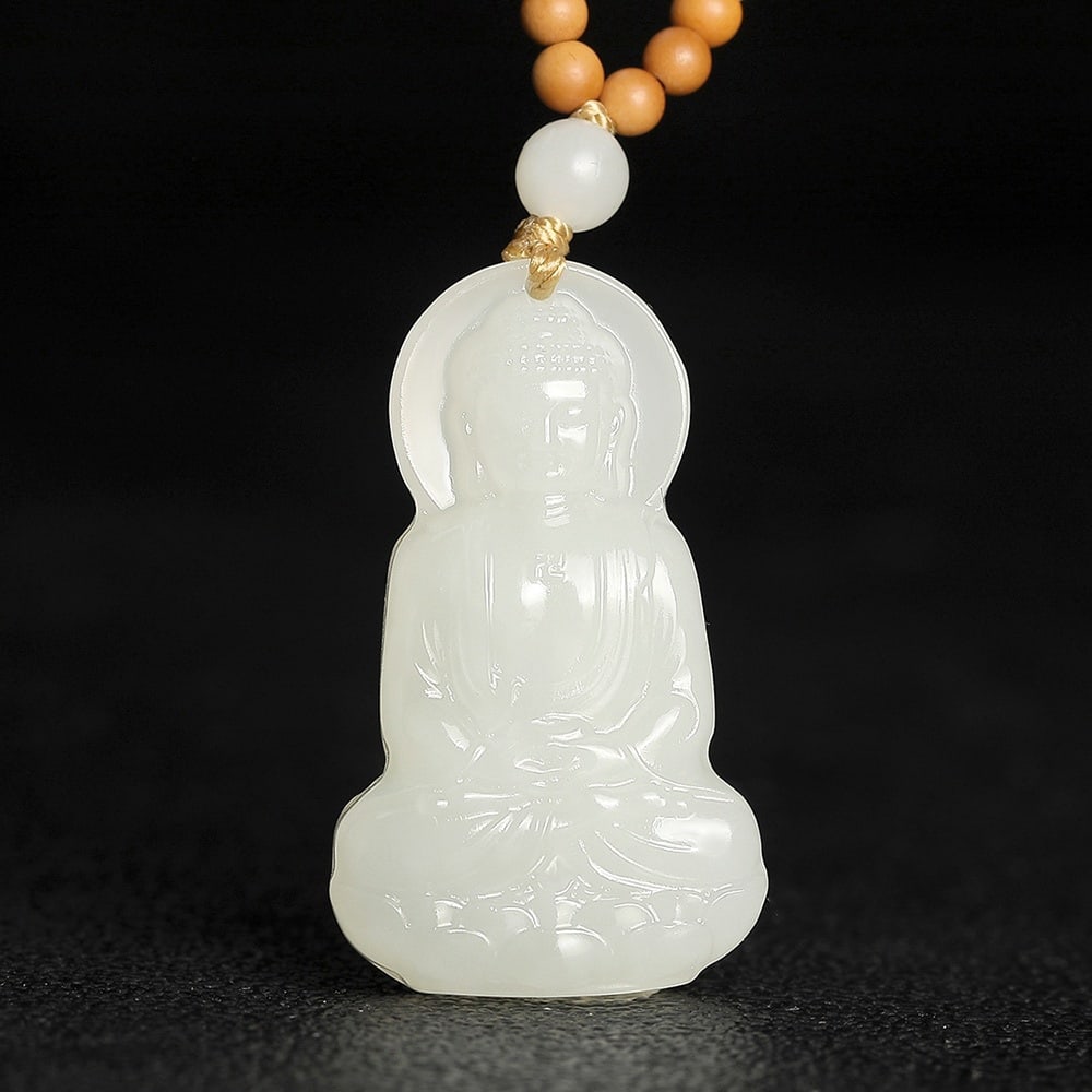 An Exquisite White Jade Statue of Sakyamuni Pendant (1 of 7)