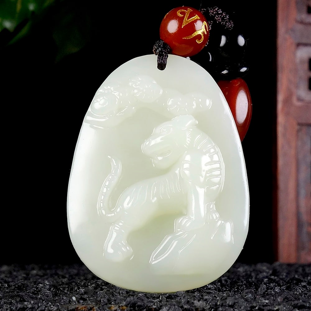 An Exquisite White Jade Tiger Pattern Pendant (1 of 6)
