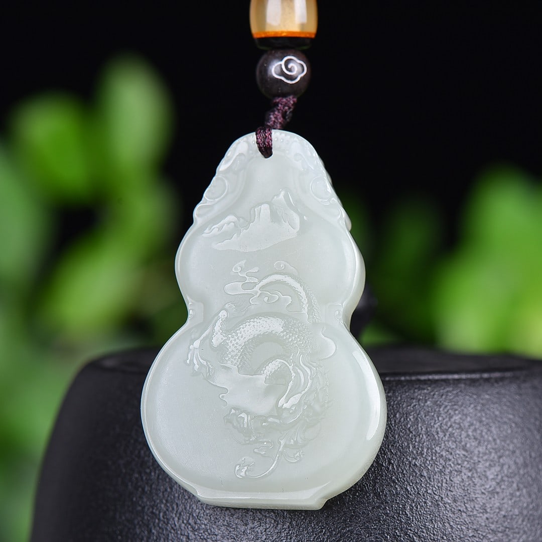 An Exquisite White Jade Dragon Pattern Pendant: An Exquisite White Jade Dragon Pattern Pendant,Size:1.1inx1.7in 白玉龙纹挂件