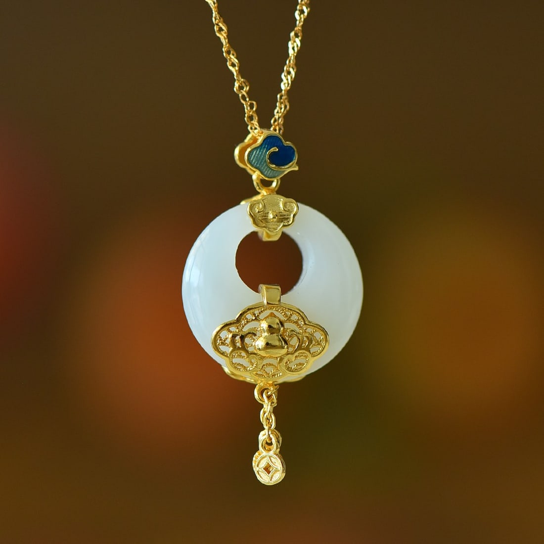 An Exquisite Sterling Silver-Gold Plated Inlaid White Jade Pendant: An Exquisite Sterling Silver-Gold Plated Inlaid White Jade Pendant 纯银镀金镶白玉吊坠
