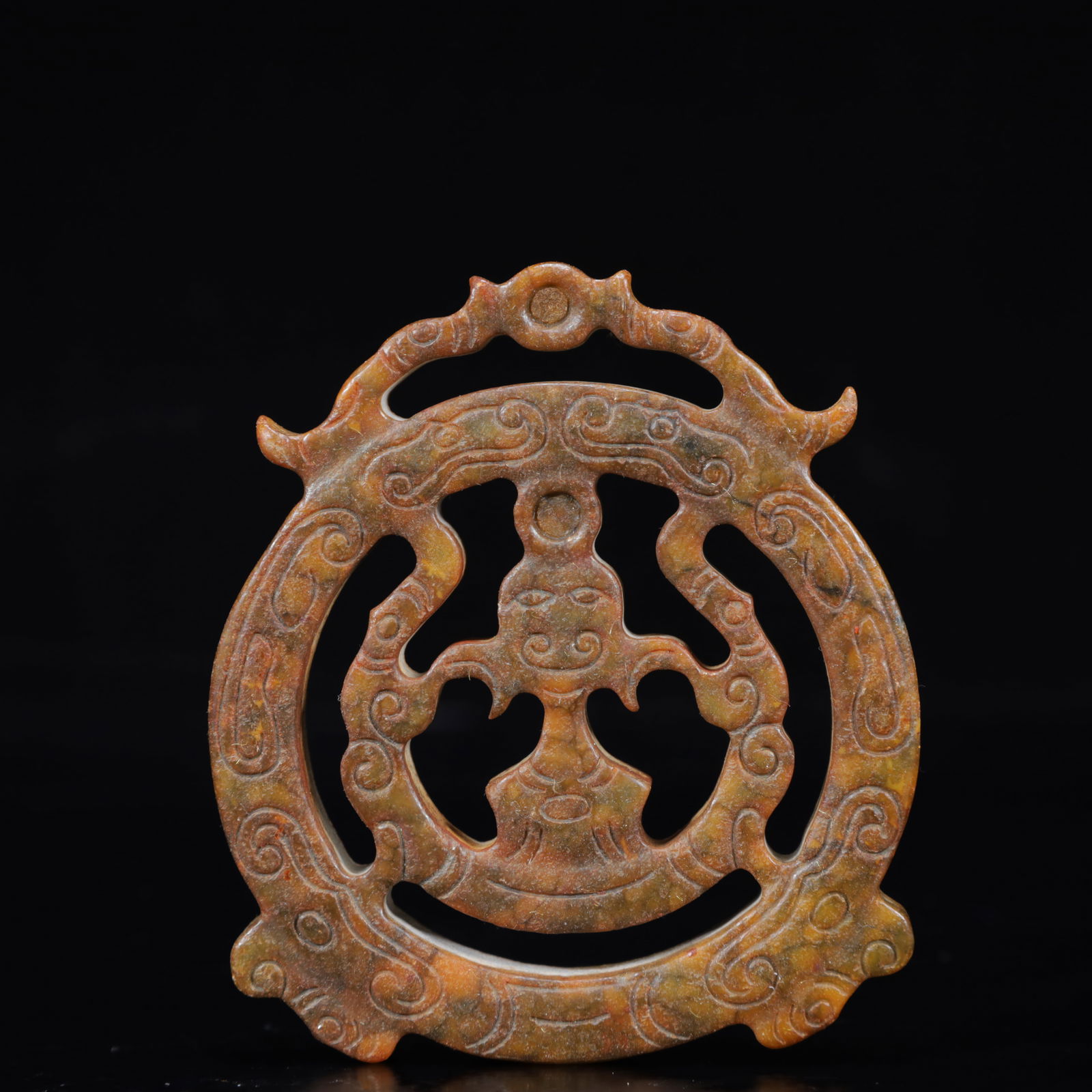 A Rare Gaogu yu Beast-Face Pendant: A Rare Gaogu yu Beast-Face Pendant,Ancient Time,China,Size:3.1inx0.4inx3.5in,Weight:104g 高古玉兽面挂件,中国远古时期