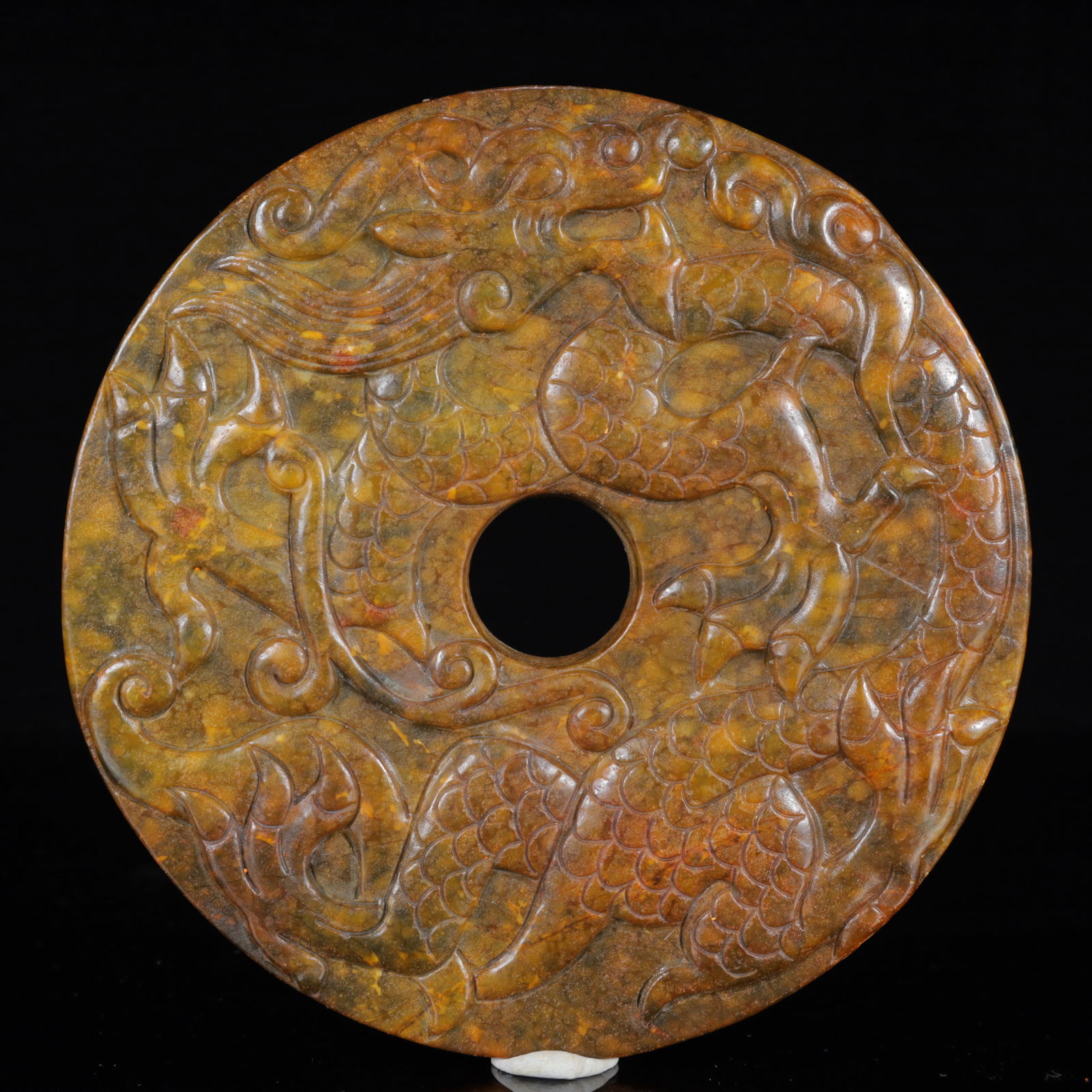 A Rare Gaogu yu Dragon Pendant: A Rare Gaogu yu Dragon Pendant,Ancient Time,China,Size:6.7inx0.4inx6.7in,Weight:666g 高古玉龙挂件,中国远古时期