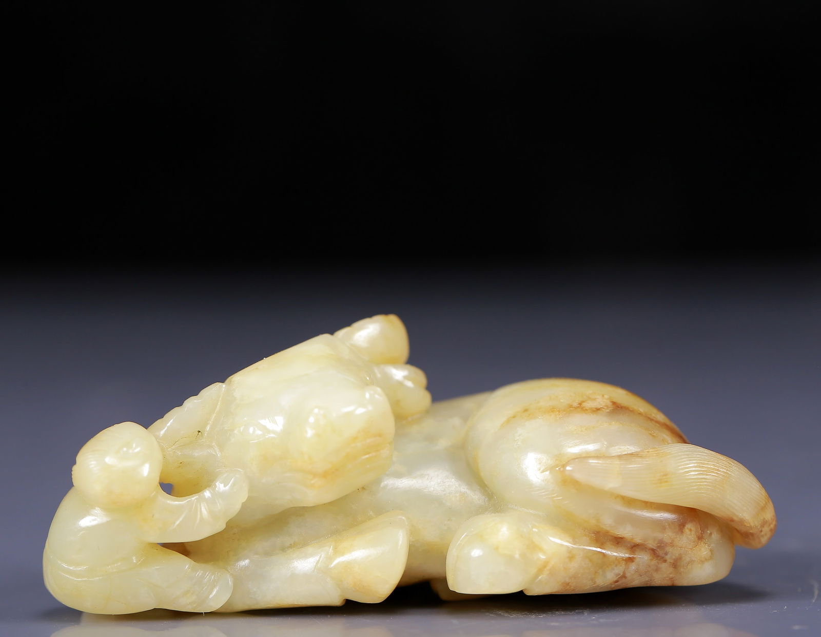 An Exquisite White Jade Buffalo Ornament: An Exquisite White Jade Buffalo Ornament ,Qing Dynasty, China,Size:3.1inx1.8inx1in,Weight:115g 白玉牛摆件，清代