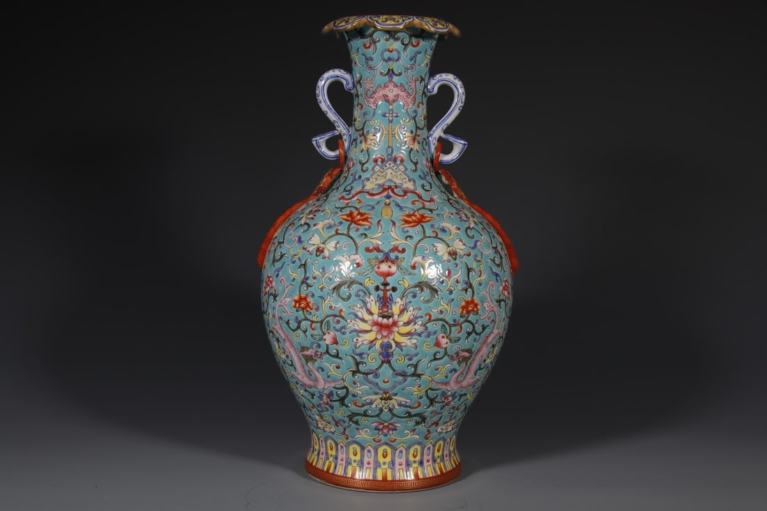 An Exquisite Green Ground Enamel Lotus Pattern Double-Ears Vase: An Exquisite Green Ground Enamel Lotus Pattern Double-Ears Vase,Qing Dynasty,China,Jiaqing Six-character Mark,Size:13.4inx4.7in 绿地珐琅彩缠枝莲纹