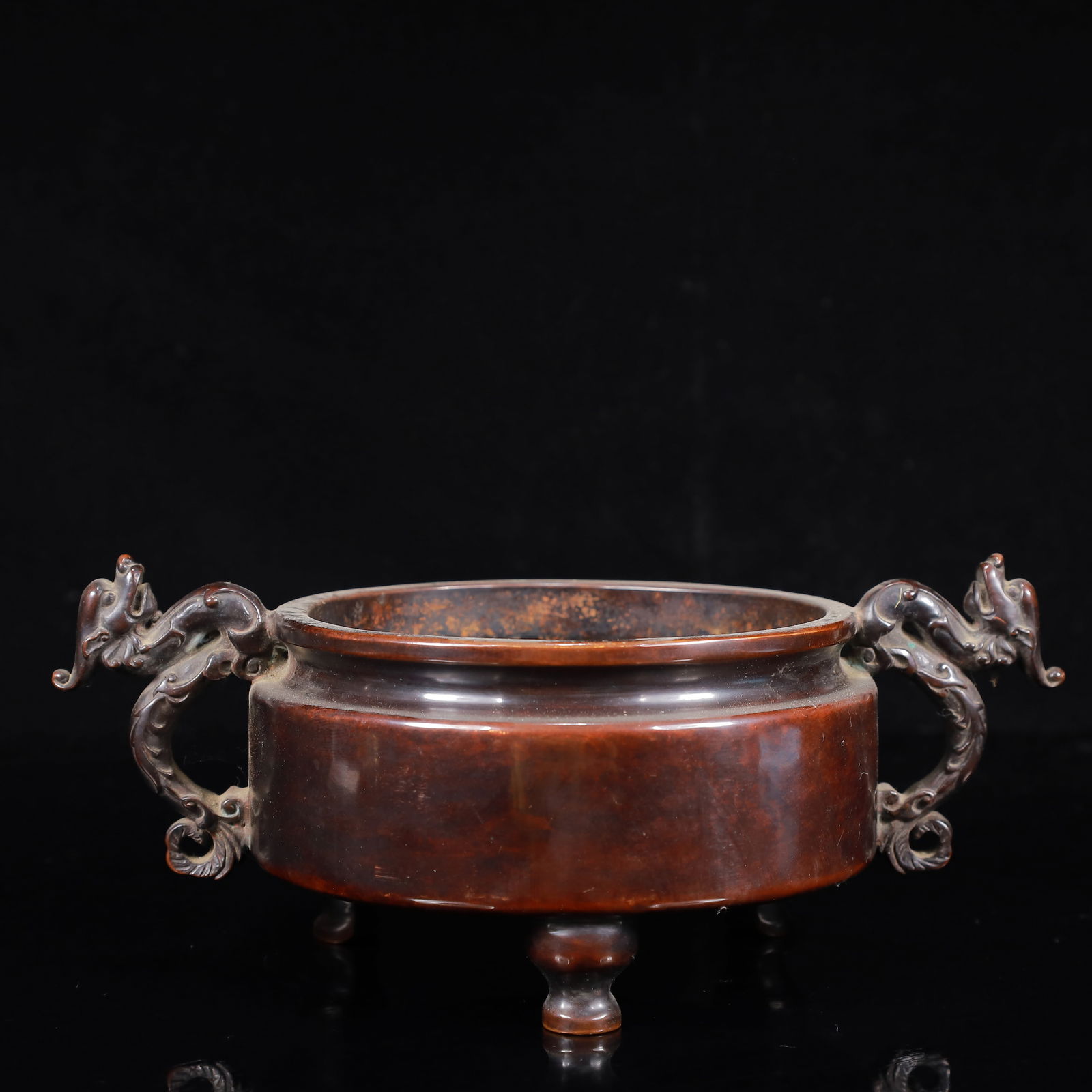 A Rare Bronze Dragon-Ears Tripod Censer: A Rare Bronze Dragon-Ears Tripod Censer,Ming Dynasty,China,With Mark,Size:9.1inx5.1inx3.9in,Weight:2400g 