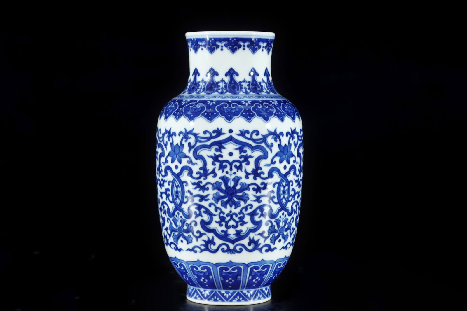 An Exquisite Blue and White Lotus Pattern Vase: An Exquisite Blue and White Lotus Pattern Vase,Qing Dynasty,China,Qianlong Six-character Mark,Size:7.5inx3.9in 
