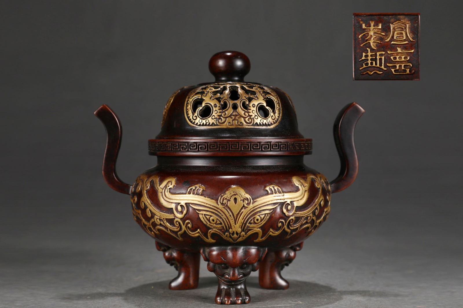 A Fine Gilt Bronze Beast-Face Pattern Double-Ears and Tripod Censer: A Fine Gilt Bronze Beast-Face Pattern Double-Ears and Tripod Censer,Ming Dynasty, China, Xuande Four-character Mark,Size:6.7inx5.5in,Weight:2800g 