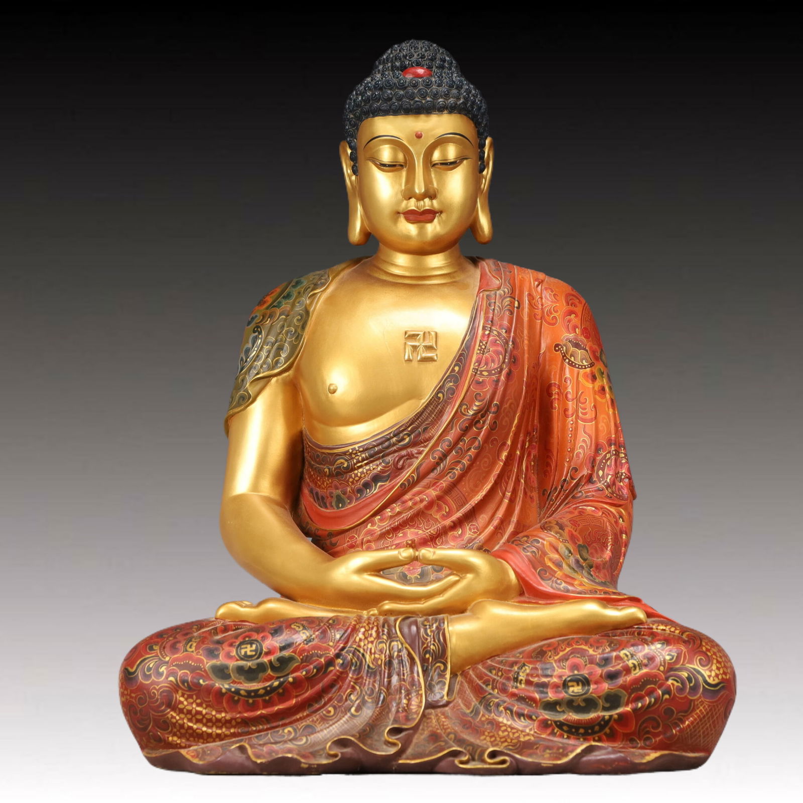 A Solemn Eaglewood Painted Gold Statue of Sakyamuni: A Solemn Eaglewood Painted Gold Statue of Sakyamuni,Qing Dynasty, China,Size:14.6inx12.6inx19.7in,Weight:10550g 