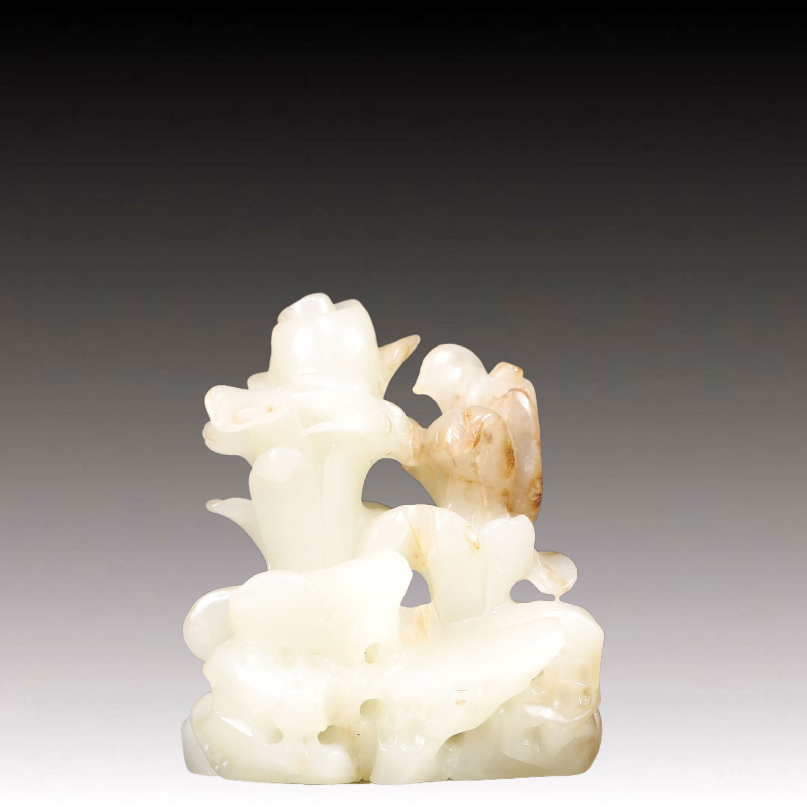 An Exquisite White Jade Rockery Ornament: An Exquisite White Jade Rockery Ornament, Qing Dynasty, China,Size:3inx1.6inx3.5in,Weight:300g 白玉山子摆件, 中国清代