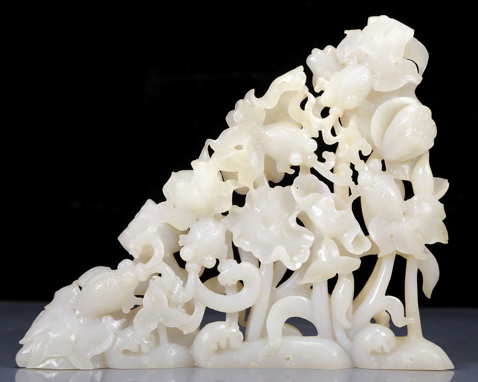 An Exquisite White Jade Lotus and Fish Pattern Ornament: An Exquisite White Jade Lotus and Fish Pattern Ornament,Qing Dynasty, China,Size:11inx1.8inx9.1in,Weight:1565g 白玉荷花金鱼摆件，清代