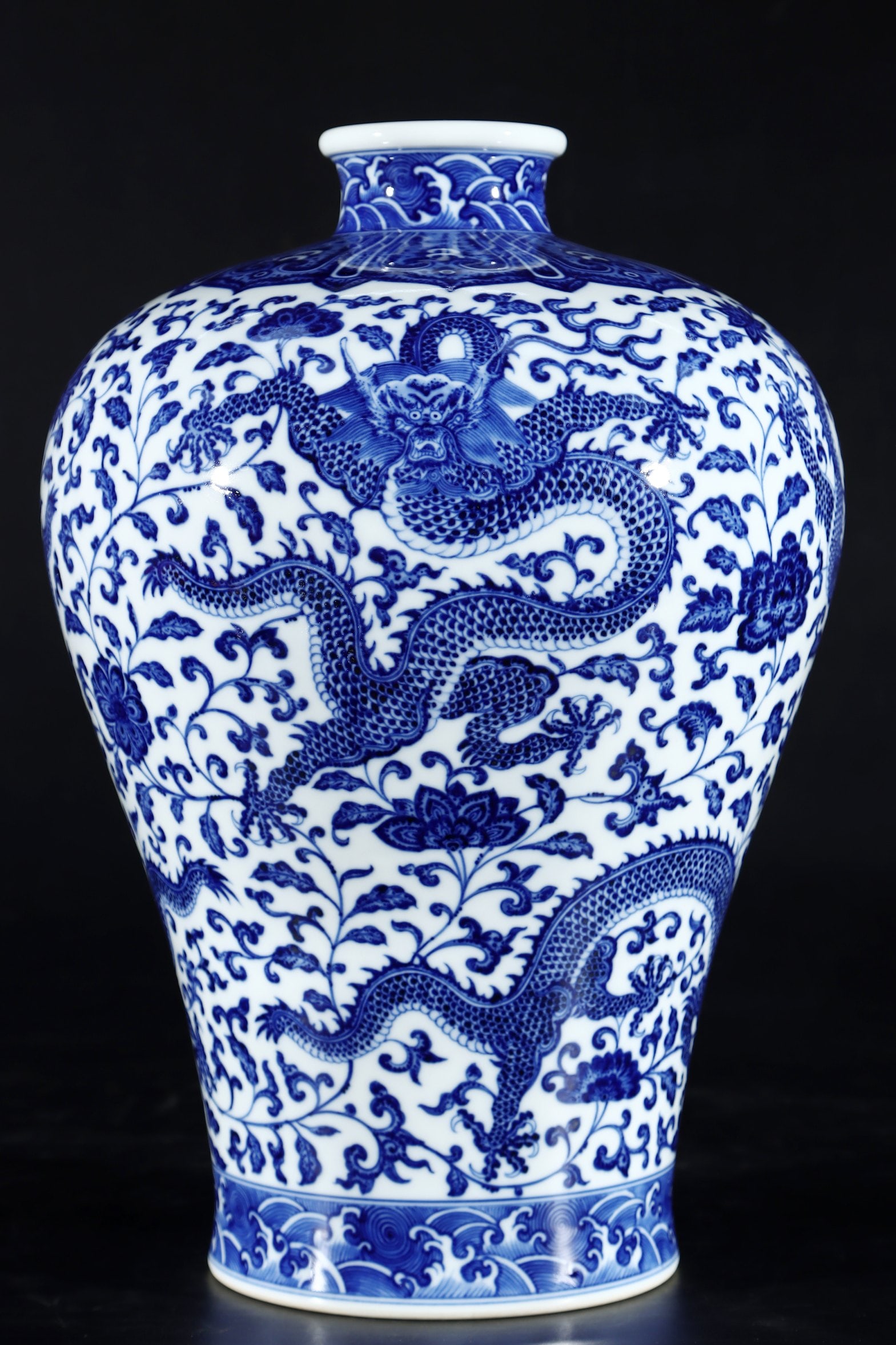 An Exquisite Blue and White Lotus and Dragon Pattern Vase: An Exquisite Blue and White Lotus and Dragon Pattern Vase,Qing Dynasty,China,Qianlong Six-character Mark,Size:14.2inx9.8in 青花缠枝莲龙纹瓶,中