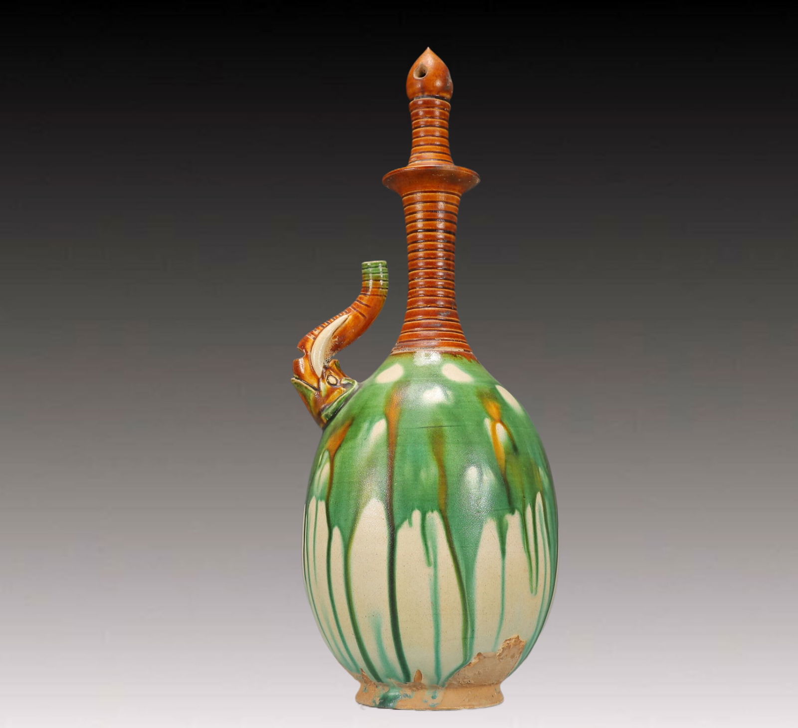 A Rare Tang Tri-Color Glazed Pottery Ewer: A Rare Tang Tri-Color Glazed Pottery Ewer,Tang Dynasty, China,Size:5.3inx5.3inx14.6in,Weight:1300g 唐三彩执壶，中国唐代