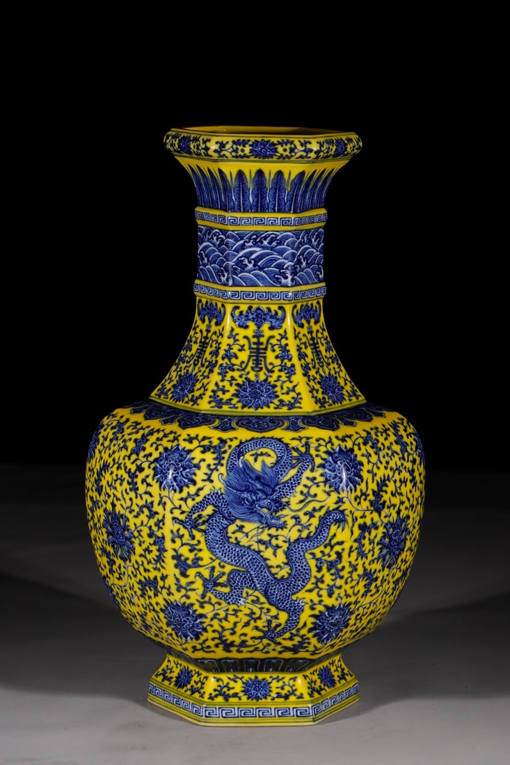 An Exquisite Yellow Ground Blue and White Lotus and Dragon Pattern Vase: An Exquisite Yellow Ground Blue and White Lotus and Dragon Pattern Vase,Qing Dynasty,China,Qianlong Six-character Mark,Size:19.2in 