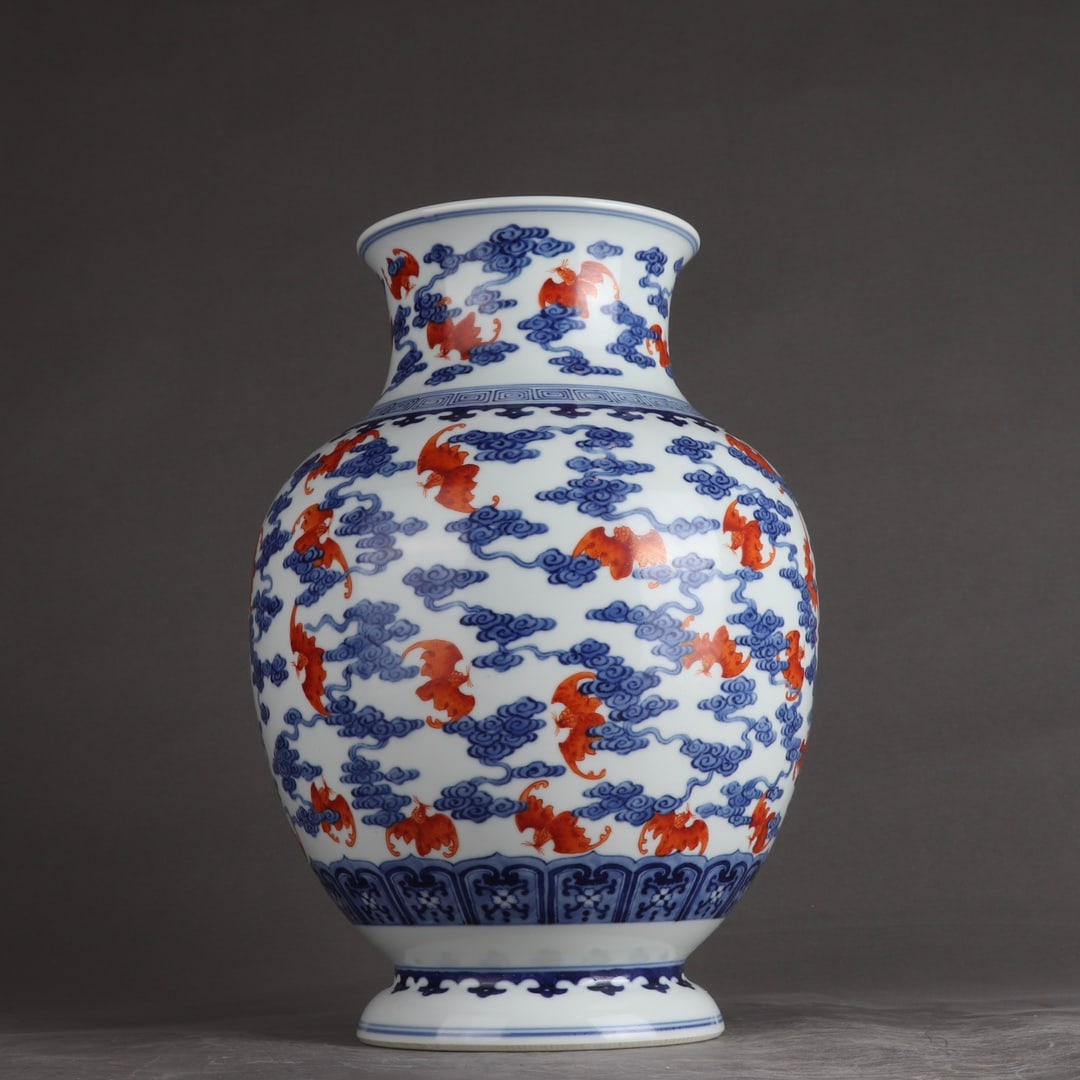 An Exquisite Blue and White Iron-Red Auspicious Cloud and Bats Pattern Vase: An Exquisite Blue and White Iron-Red Auspicious Cloud and Bats Pattern Vase,Qing Dynasty,China,Daoguang Six-character Mark,Size:12.1inx8.1in 