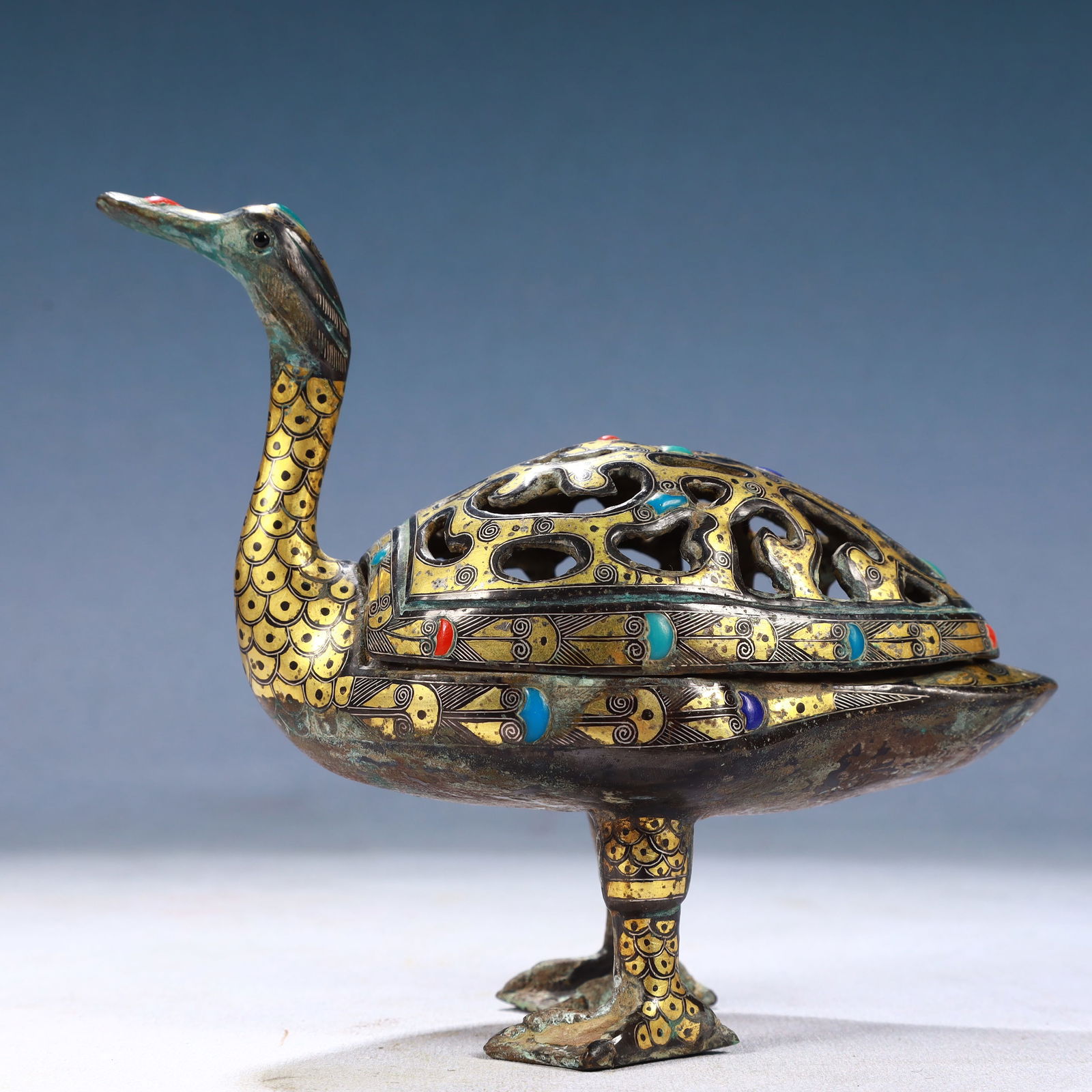 An Exquisite Bronze Inlaid Gold and Silver Duck-Shaped Censer: An Exquisite Bronze Inlaid Gold and Silver Duck-Shaped Censer,Qing Dynasty, China,Size:6.7inx3.5inx5.9in,Weight:850g 