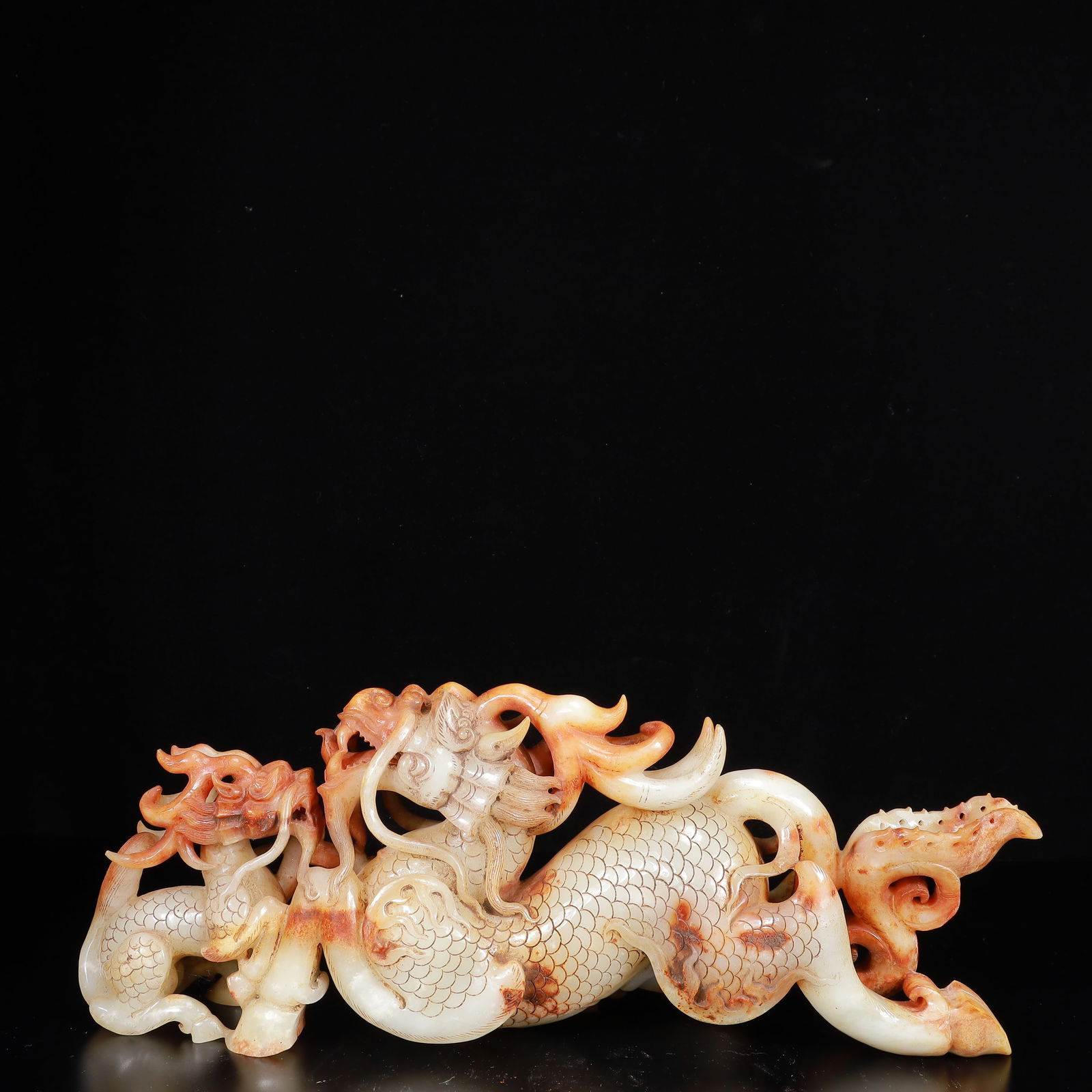 An Exquisite White Jade Dragon Ornament (1 of 14)
