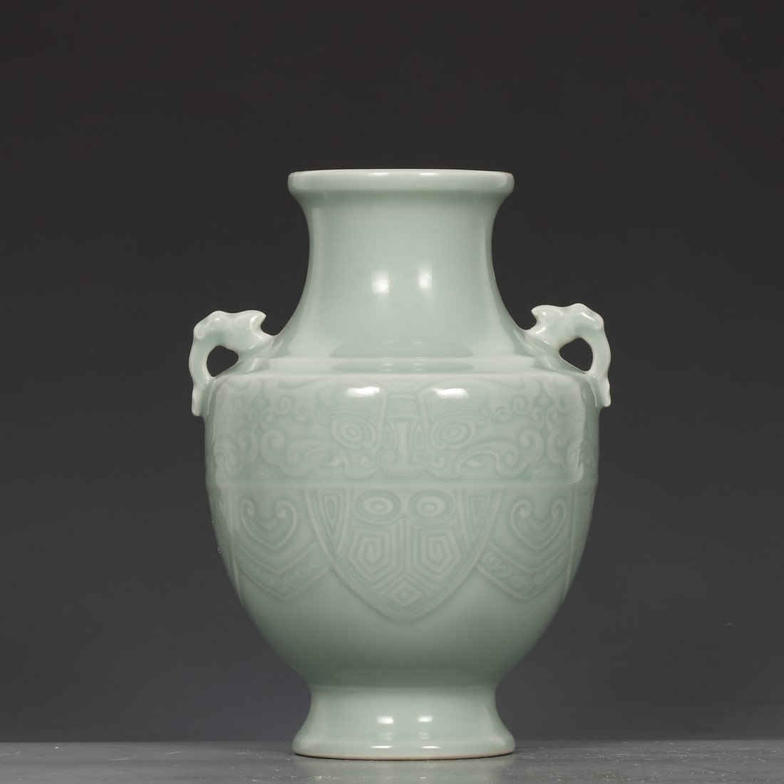 An Exquisite Celadon Glazed Auspicious Cloud Pattern Double-Ears Vase (1 of 9)