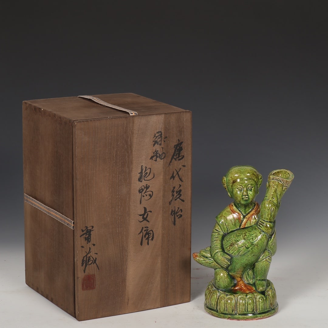 An Exquisite Gongxian yao Green Glazed Figure Ornament: An Exquisite Gongxian yao Green Glazed Figure Ornament,Tang Dynasty,China,Size:7.9inx5.9in 巩县窑绿釉人物摆件,中国唐代
