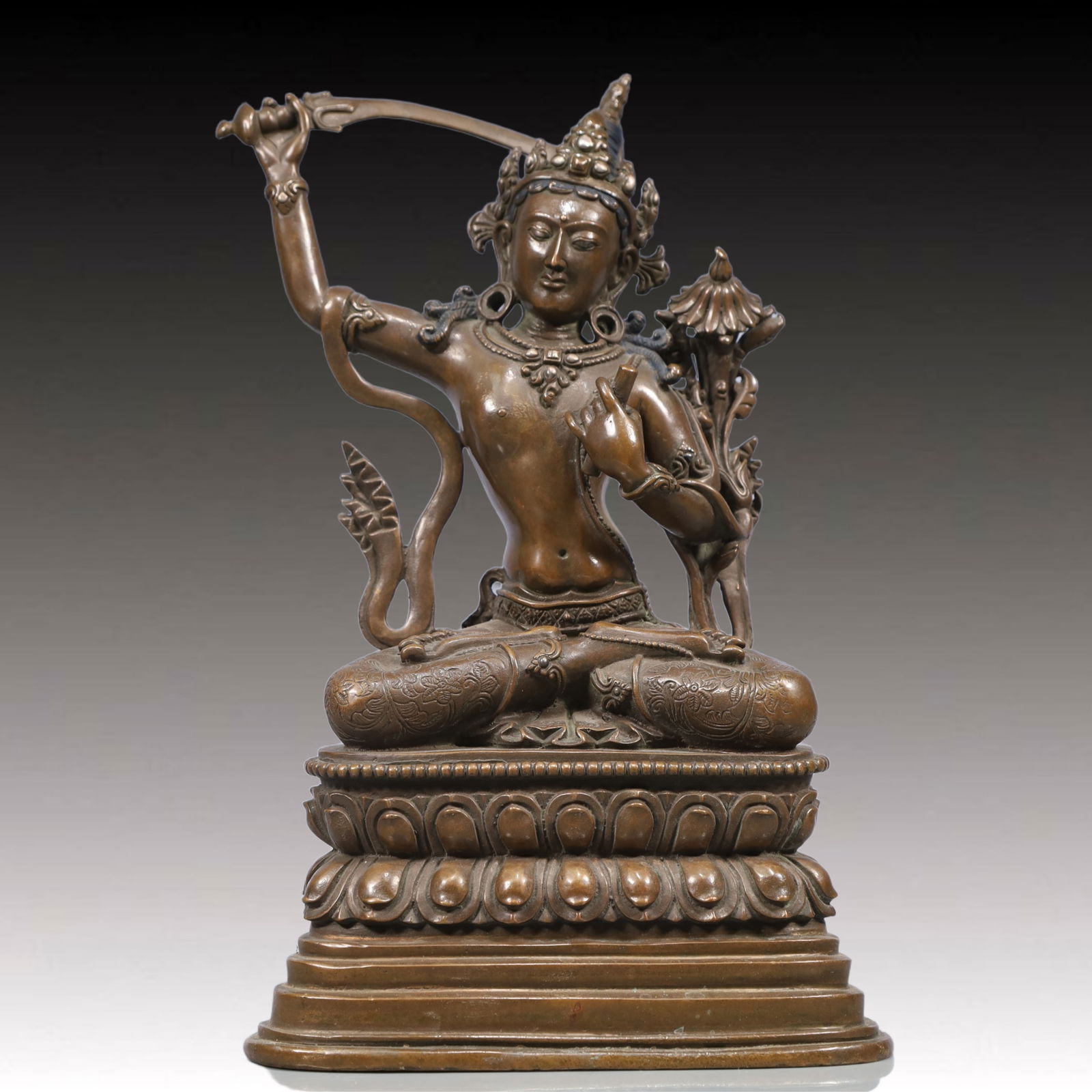 A Solemn Bronze Statue of Manjusri: A Solemn Bronze Statue of Manjusri, Qing Dynasty, China, Size:6.3inx3.9inx10.6in, Weight:2200g 