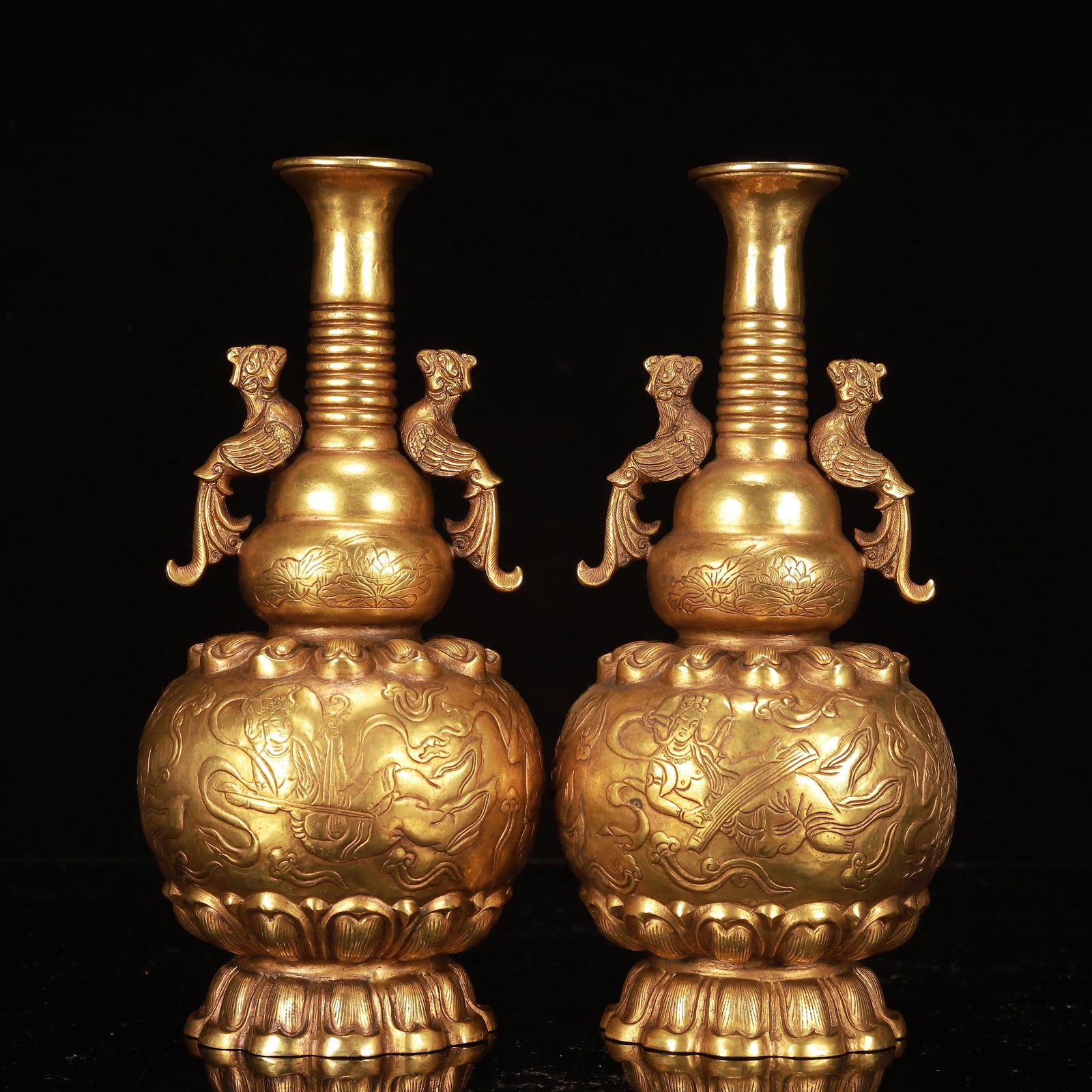 A Pair of Exquisite Gilt Bronze Figure Pattern Phoenix-Ears Gourd-Shaped Vases: A Pair of Exquisite Gilt Bronze Figure Pattern Phoenix-Ears Gourd-Shaped Vases,Qing Dynasty, China,Size:5.1inx9.4in,Weight:1950g 
