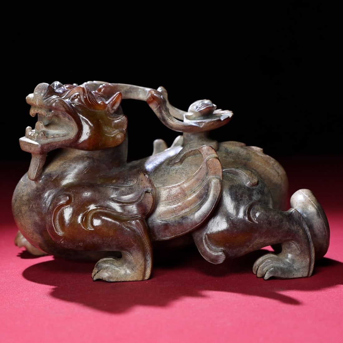 An Exquisite Archaic Jade Auspicious Beast Ornament (1 of 9)
