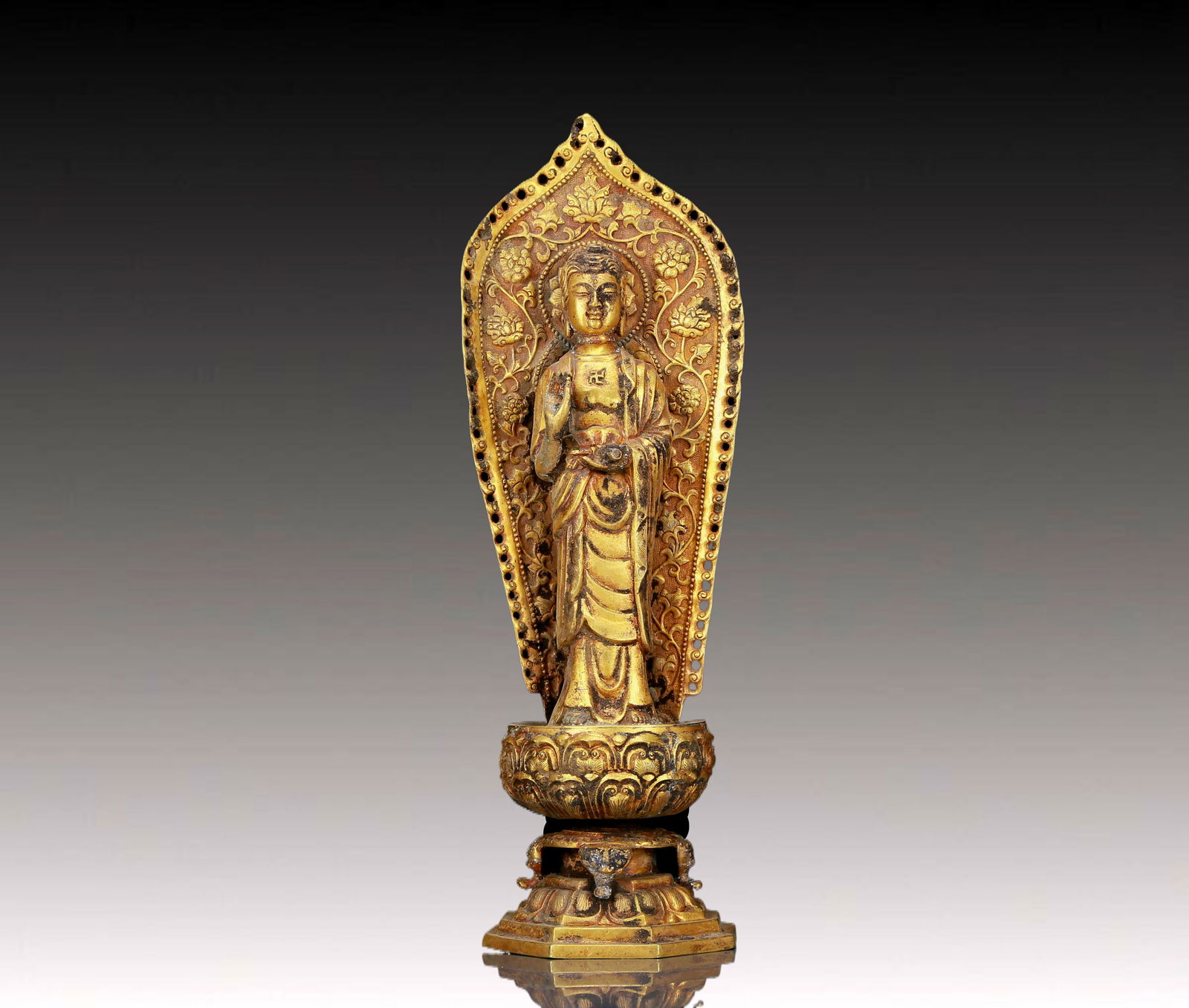 A Fine Gilt Bronze Statue of Sakyamuni: A Fine Gilt Bronze Statue of Sakyamuni,Qing Dynasty, China,Size:4.7inx3.9inx14.2in,Weight:1565g 铜鎏金释迦摩尼立像，清代