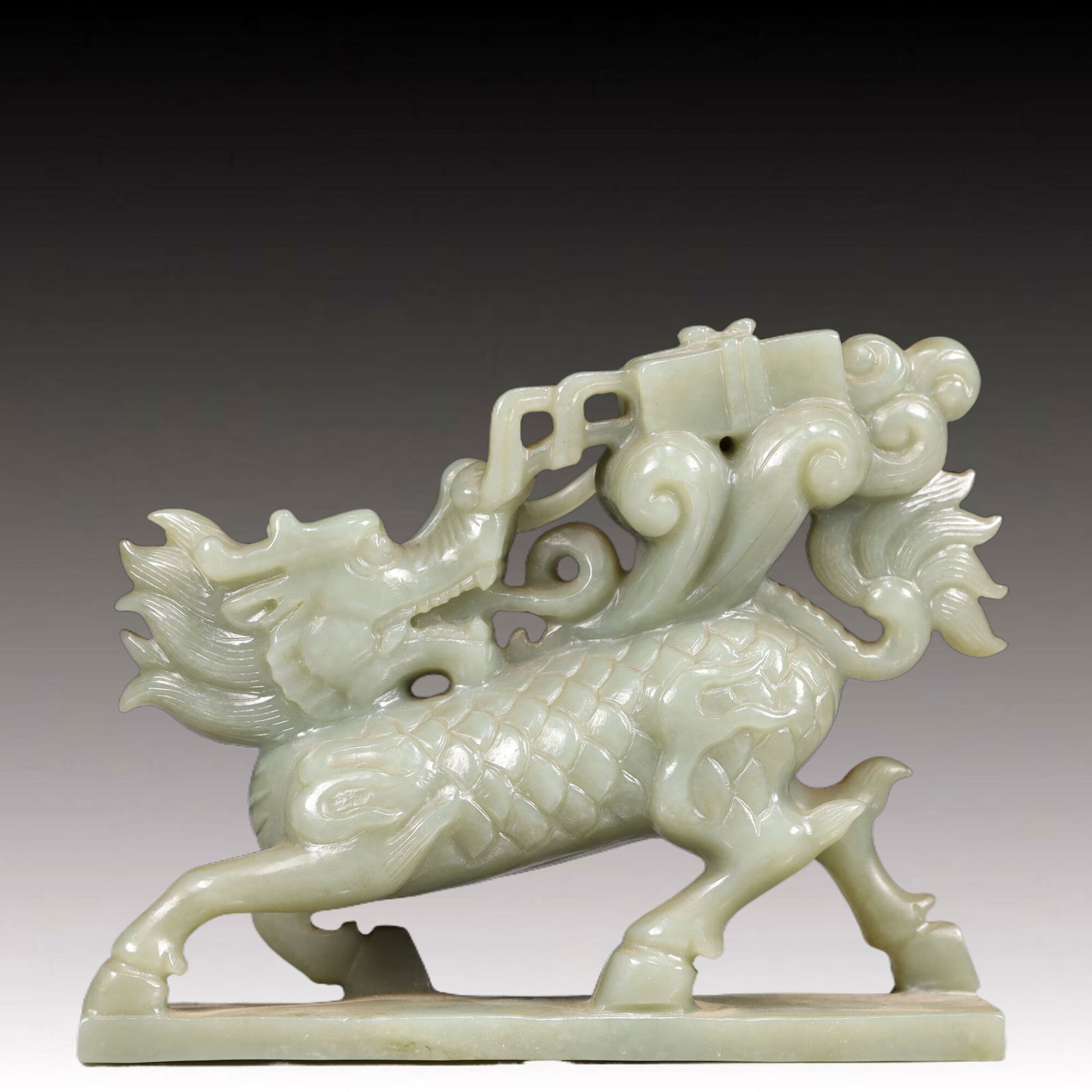 An Exquisite Greenish Jade Auspicious Beast Ornament: An Exquisite Greenish Jade Auspicious Beast Ornament, Qing Dynasty, China,Size:6.5inx1.8inx4.9in,Weight:1000g 青玉瑞兽摆件, 中国清代
