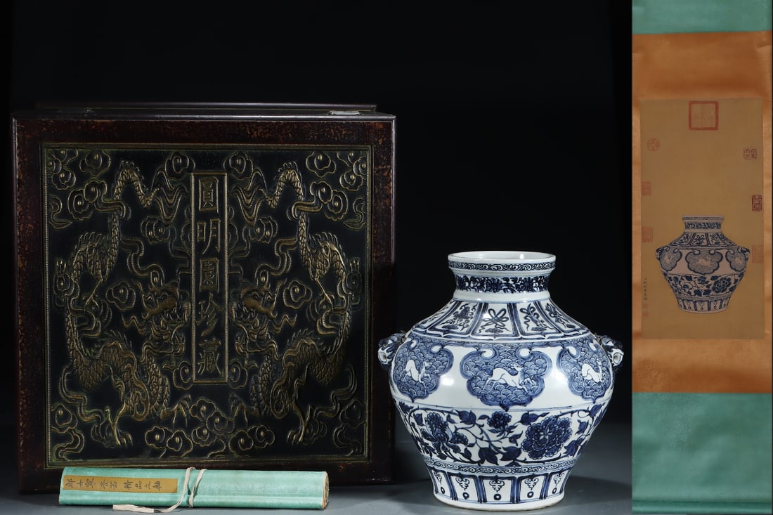 An Exquisite Blue and White Auspicious Beast Pattern Beast-Ears Jar,with Chinese Vertical Scroll Ink: An Exquisite Blue and White Auspicious Beast Pattern Beast-Ears Jar,with Chinese Vertical Scroll Ink Painting on Silk,Yuan Dynasty,China,Size:(Without frame)24.4inx12.6in,(Porcelain)14.1inx13.8in &