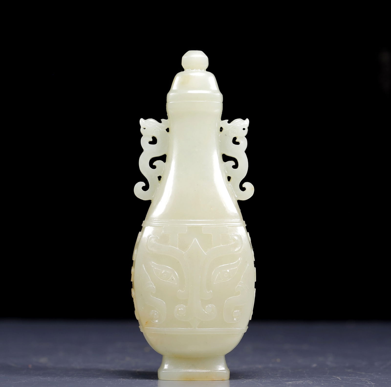 An Exquisite White Jade Beast-Face Pattern Double-Ears Bottle (1 of 8)