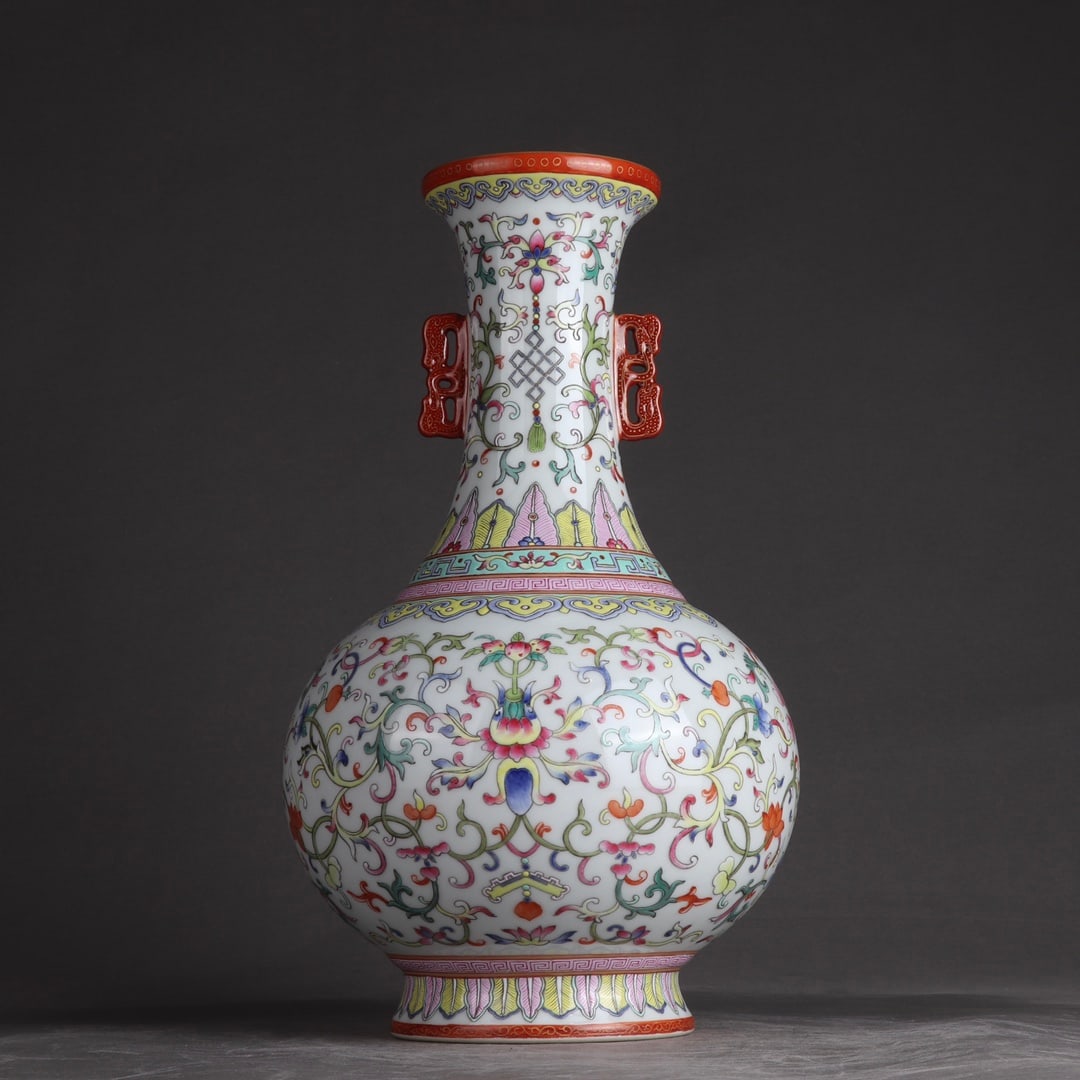 An Exquisite Famille-Rose Lotus Pattern Double-Ears Vase: An Exquisite Famille-Rose Lotus Pattern Double-Ears Vase,Qing Dynasty,China,Qianlong Six-character Mark,Size:12.2inx7.1in 