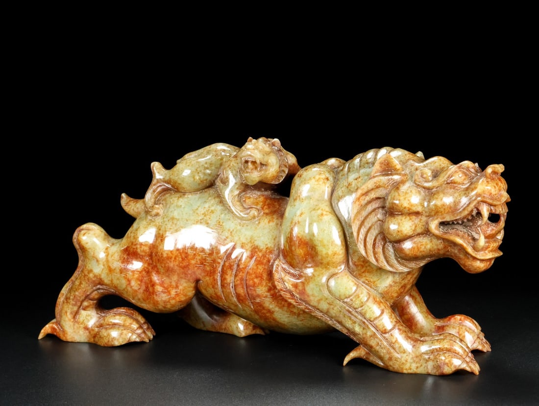 An Exquisite White Jade Auspicious Beast Ornament (1 of 9)