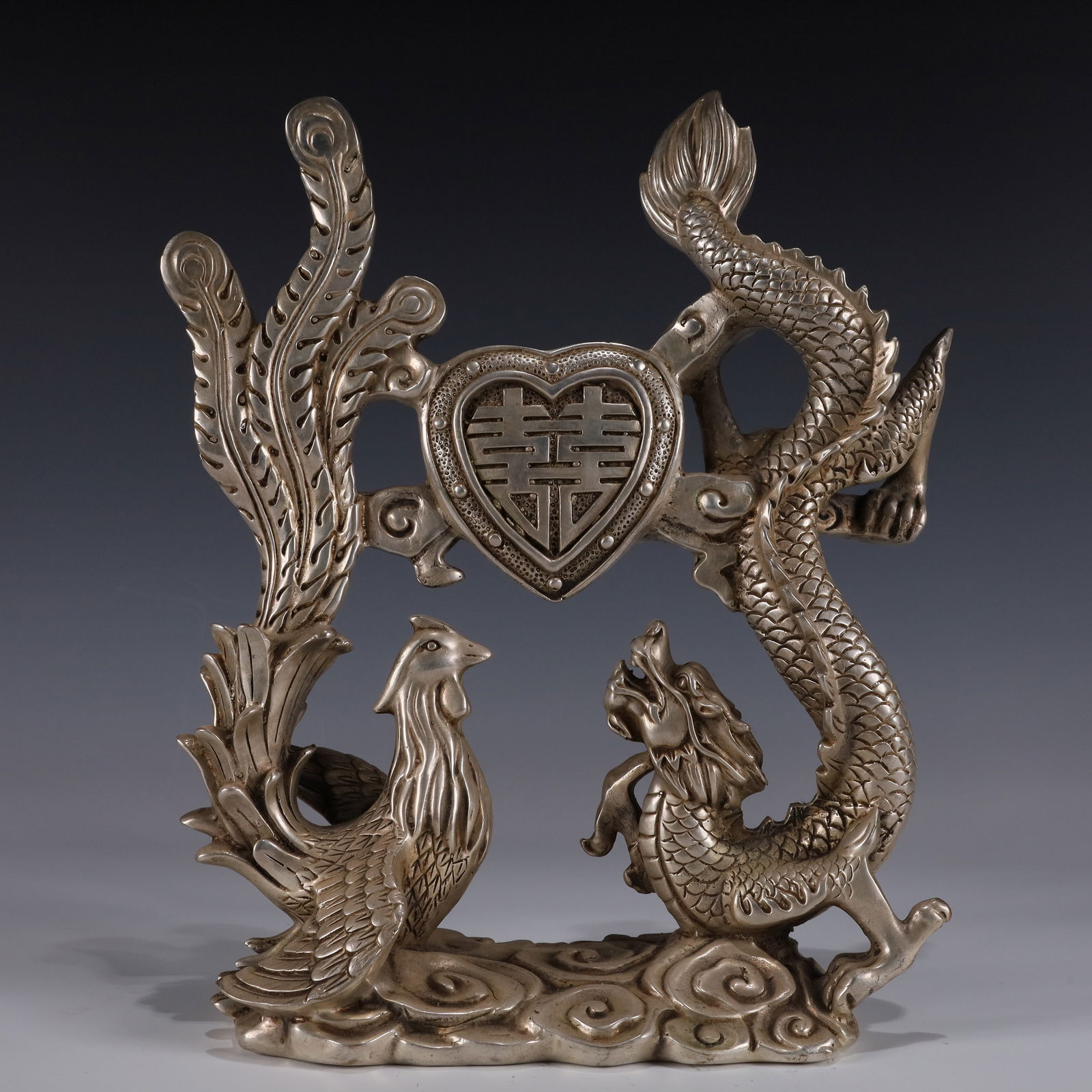 An Exquisite Silver-plated Dragon and Phoenix Ornament: An Exquisite Silver-plated Dragon and Phoenix Ornament,Qing Dynasty, China,Qianlong Four-character Mark,Size:7.9inx3.1inx10.4in,Weight:2450g, 