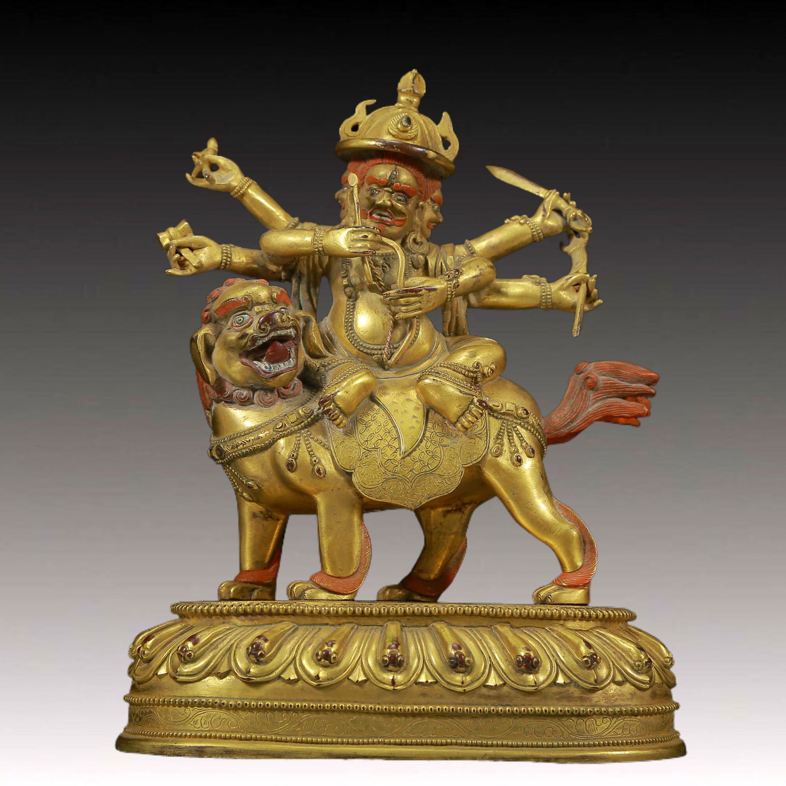 A Solemn Gilt Bronze Lion Riding Buddha Statue,With Inscription: A Solemn Gilt Bronze Lion Riding Buddha Statue,With Inscription,Ming Dynasty, China,Size: 6.1inx3.1inx7.5in,Weight:1950g 