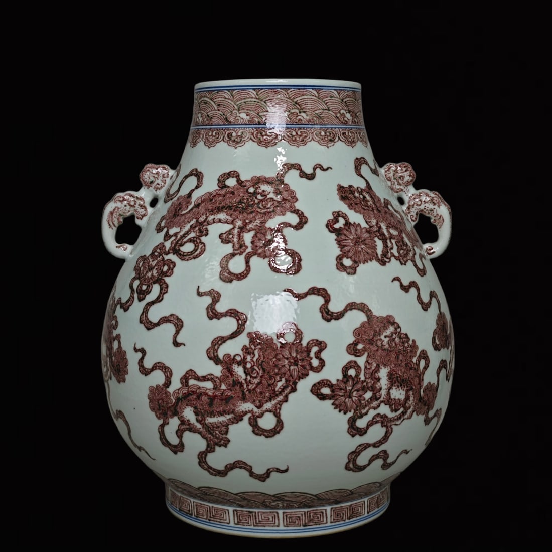 An Exquisite Underglaze-Red Lion Pattern Double-Ears Jar: An Exquisite Underglaze-Red Lion Pattern Double-Ears Jar,Qing Dynasty,China,Qianlong Six-character Mark,Size:17.7inx15in 釉里红狮子纹双耳罐,ߑ