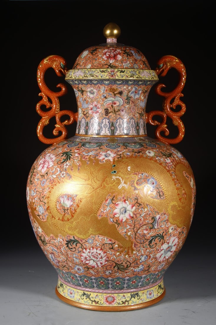 An Exquisite Enamel Lotus and Dragon Pattern Double-Ears Bottle: An Exquisite Enamel Lotus and Dragon Pattern Double-Ears Bottle,Qing Dynasty,China,Qianlong Four-character Mark,Size:23.6inx8.7in 珐琅彩缠枝莲龙纹ࡡ