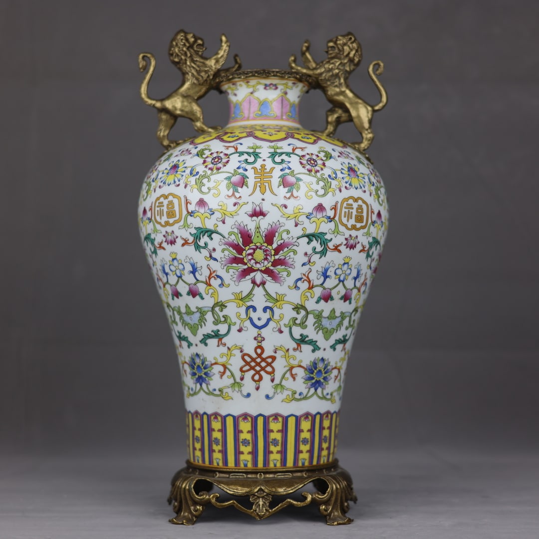 A Huge Famille-Rose Inlaid Bronze Lotus Pattern Lion-Ears Vase: A Huge Famille-Rose Inlaid Bronze Lotus Pattern Lion-Ears Vase,Qing Dynasty,China,Kangxi Six-Character Mark,Size:17.3inx8.7in 
