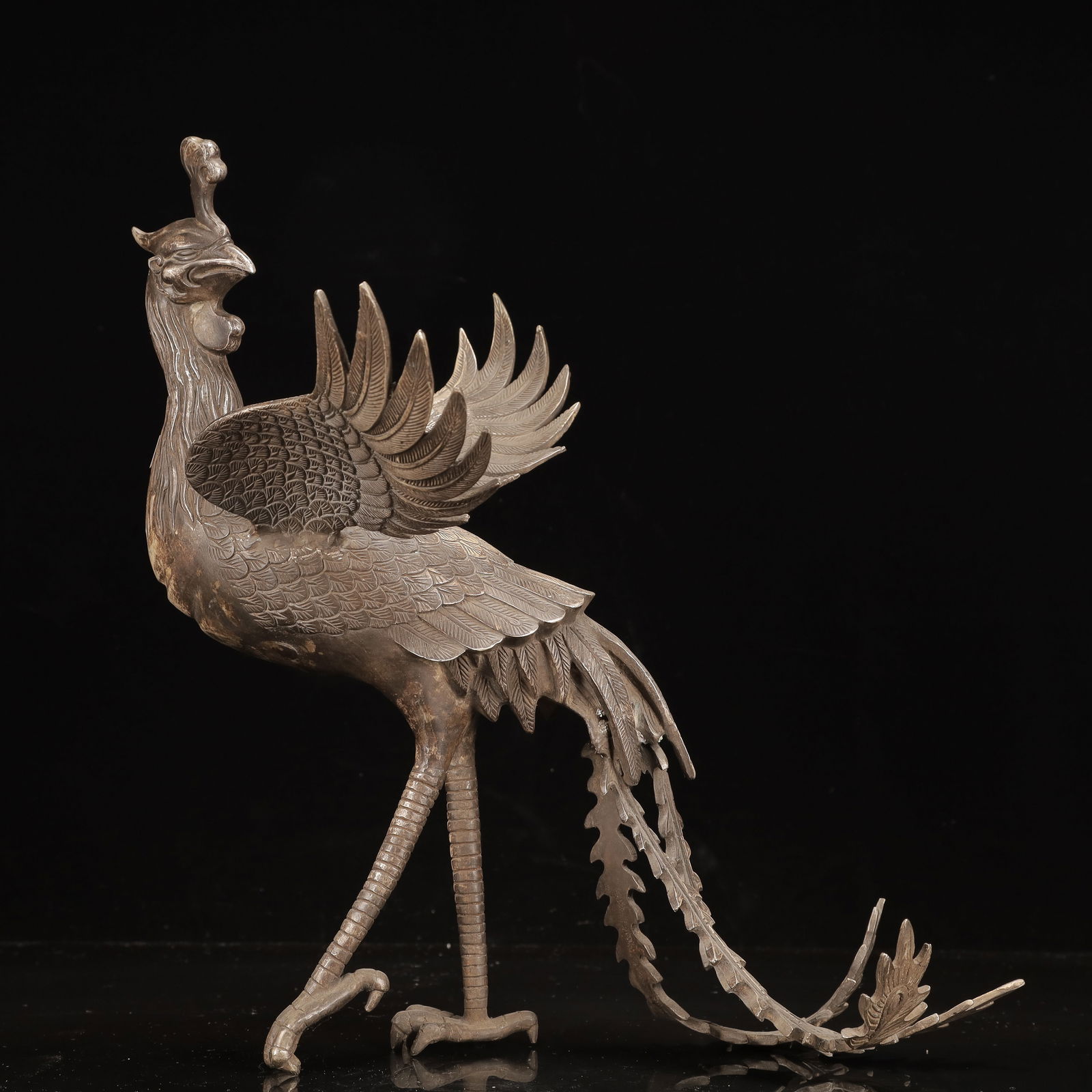 A Huge Silver-plated Copper Phoenix Ornament: A Huge Silver-plated Copper Phoenix Ornament,Qing Dynasty, China,Size:16.1inx11.8inx14.2in,Weight:3550g 铜镀银凤摆件,中国清代