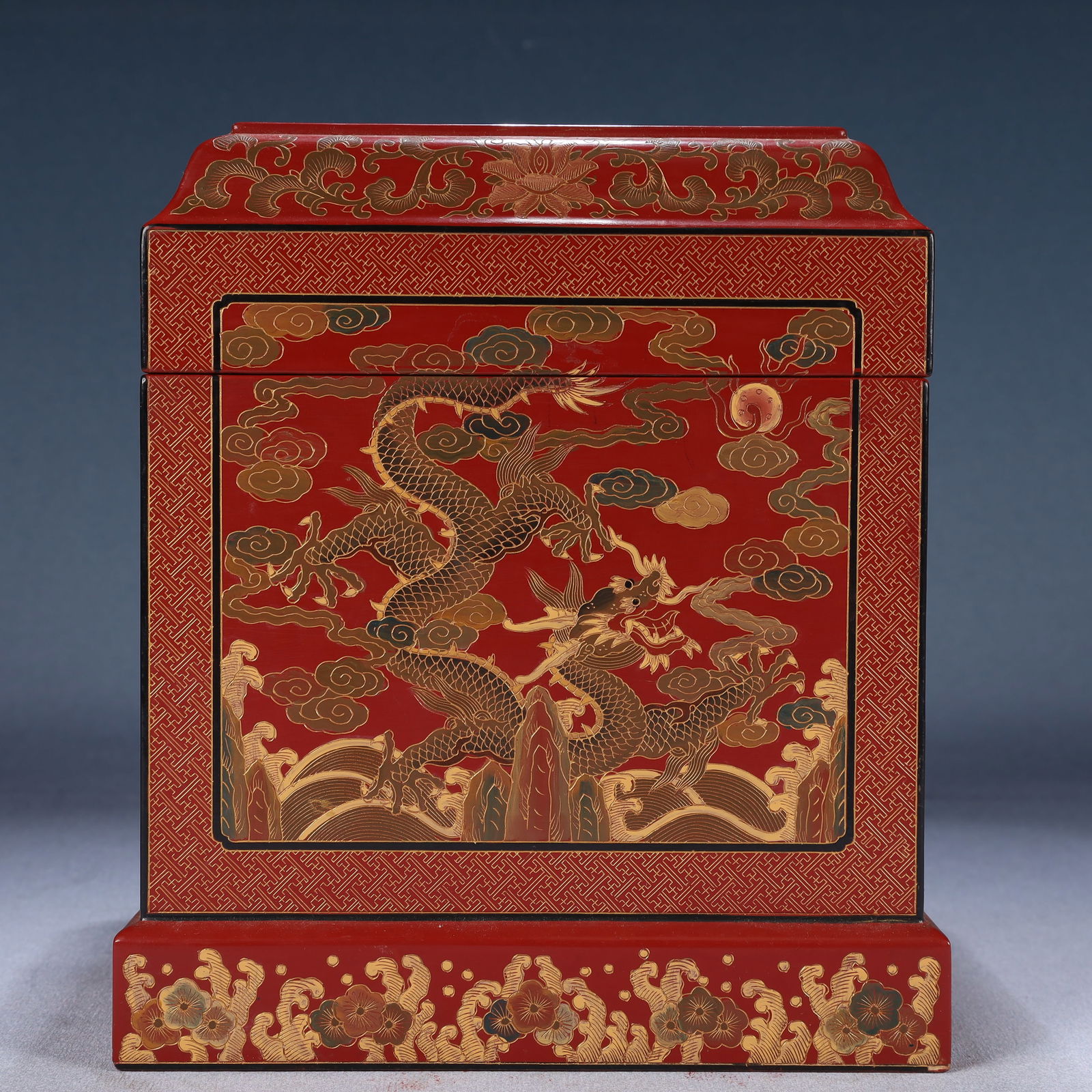 An Exquisite Carved Red Lacquer Auspicious Cloud and Dragon Pattern Cover Box: An Exquisite Carved Red Lacquer Auspicious Cloud and Dragon Pattern Cover Box,Qing Dynasty, China,Qianlong Six-character Mark,Size:7.1inx8.3in,Weight:700g 剔红漆祥云Ƙ