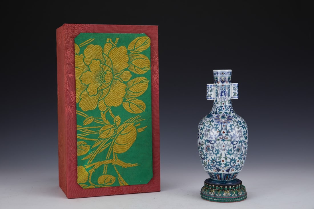 An Exquisite Doucai Lotus Pattern Double-Ears Vase: An Exquisite Doucai Lotus Pattern Double-Ears Vase,Qing Dynasty,China,Yongzheng Six-Character Mark,Size:7.5inx3.3in 