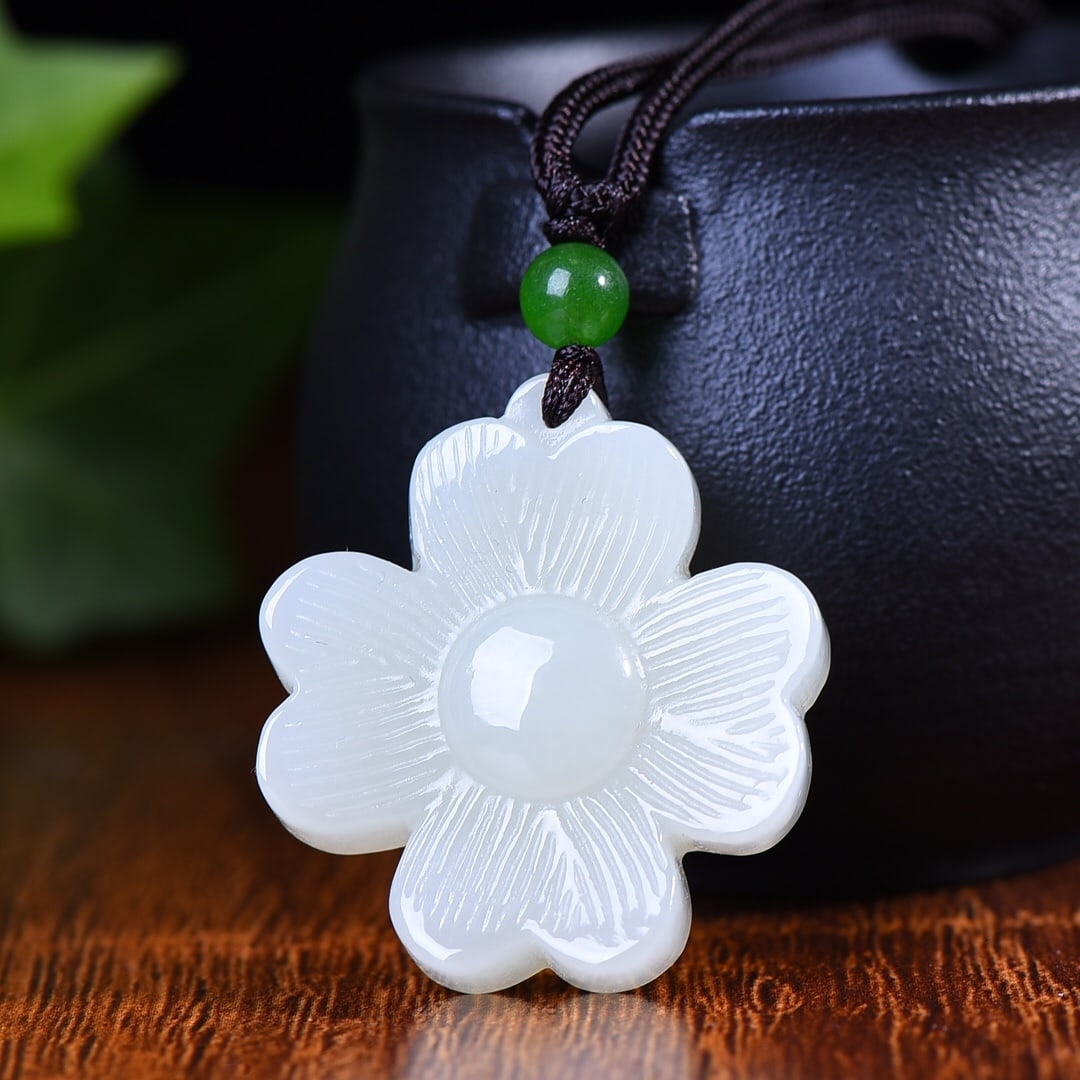 An Exquisite White Jade Pendant: An Exquisite White Jade Pendant,Size:1.3inx1.4in 白玉挂件