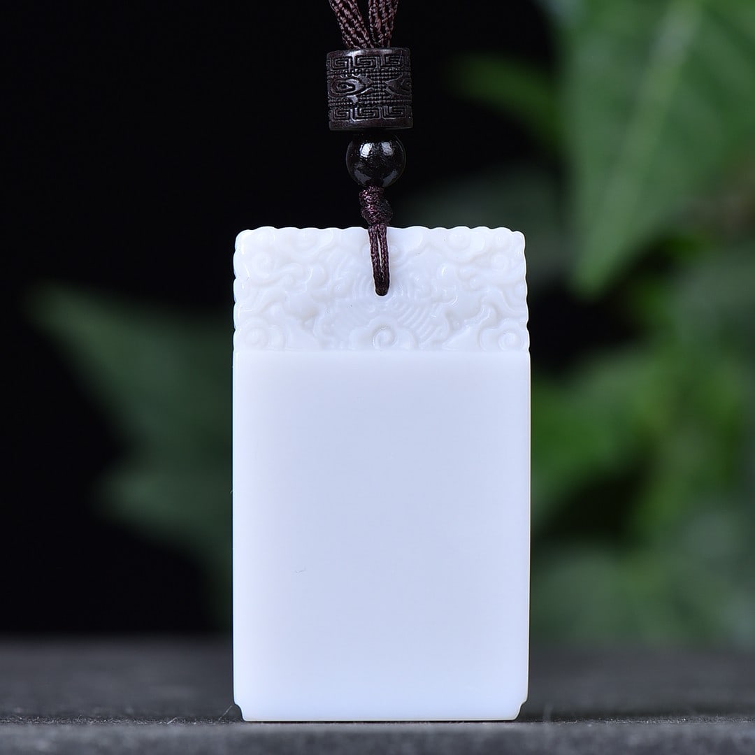An Exquisite White Jade Pendant: An Exquisite White Jade Pendant,Size:1.1inx1.9in 白玉挂件