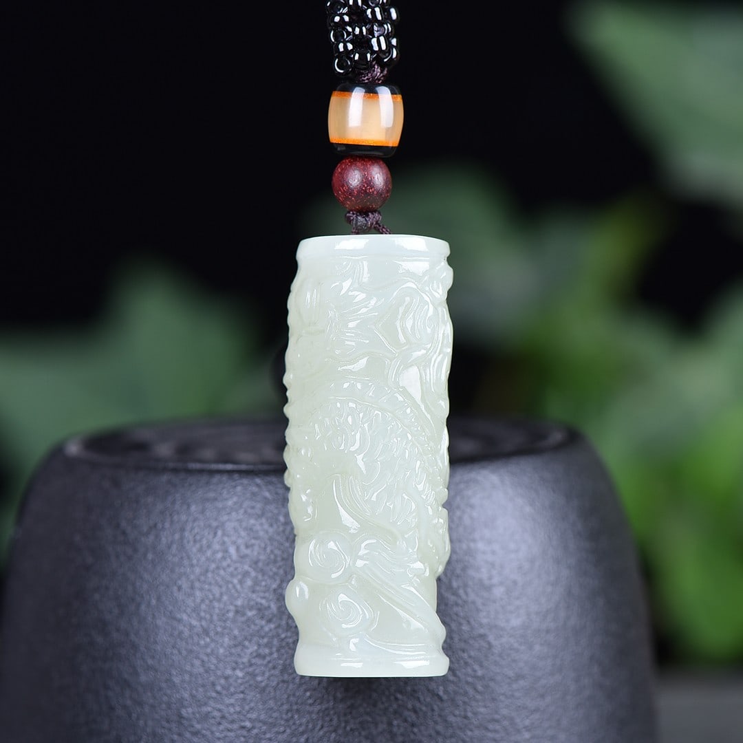 An Exquisite White Jade Dragon Pattern Pendant: An Exquisite White Jade Dragon Pattern Pendant,Size:0.7inx1.8in 白玉龙纹挂件