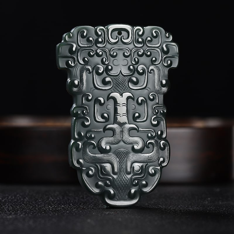 An Exquisite Cyan jade Beast-Face Pattern Ornament: An Exquisite Cyan jade Beast-Face Pattern Ornament,Size:2.6inx1.7inx0.3in 青玉兽面纹摆件