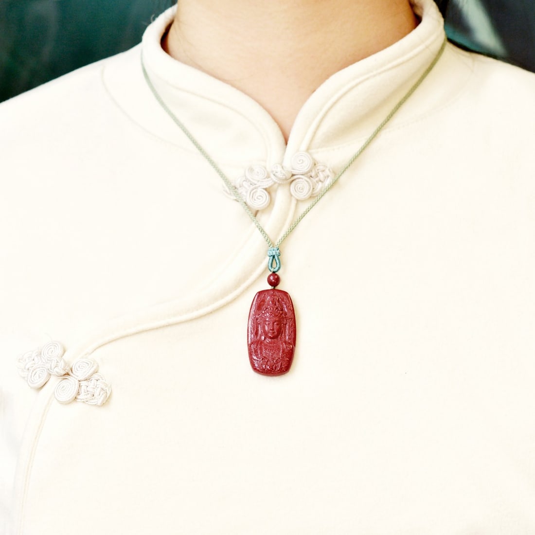 An Exquisite Cinnabar Pendant with Statue of Avalokitesvara: An Exquisite Cinnabar Pendant with Statue of Avalokitesvara,Size:0.8inx1.5in,Weight:12.1g 朱砂挂件带观音像